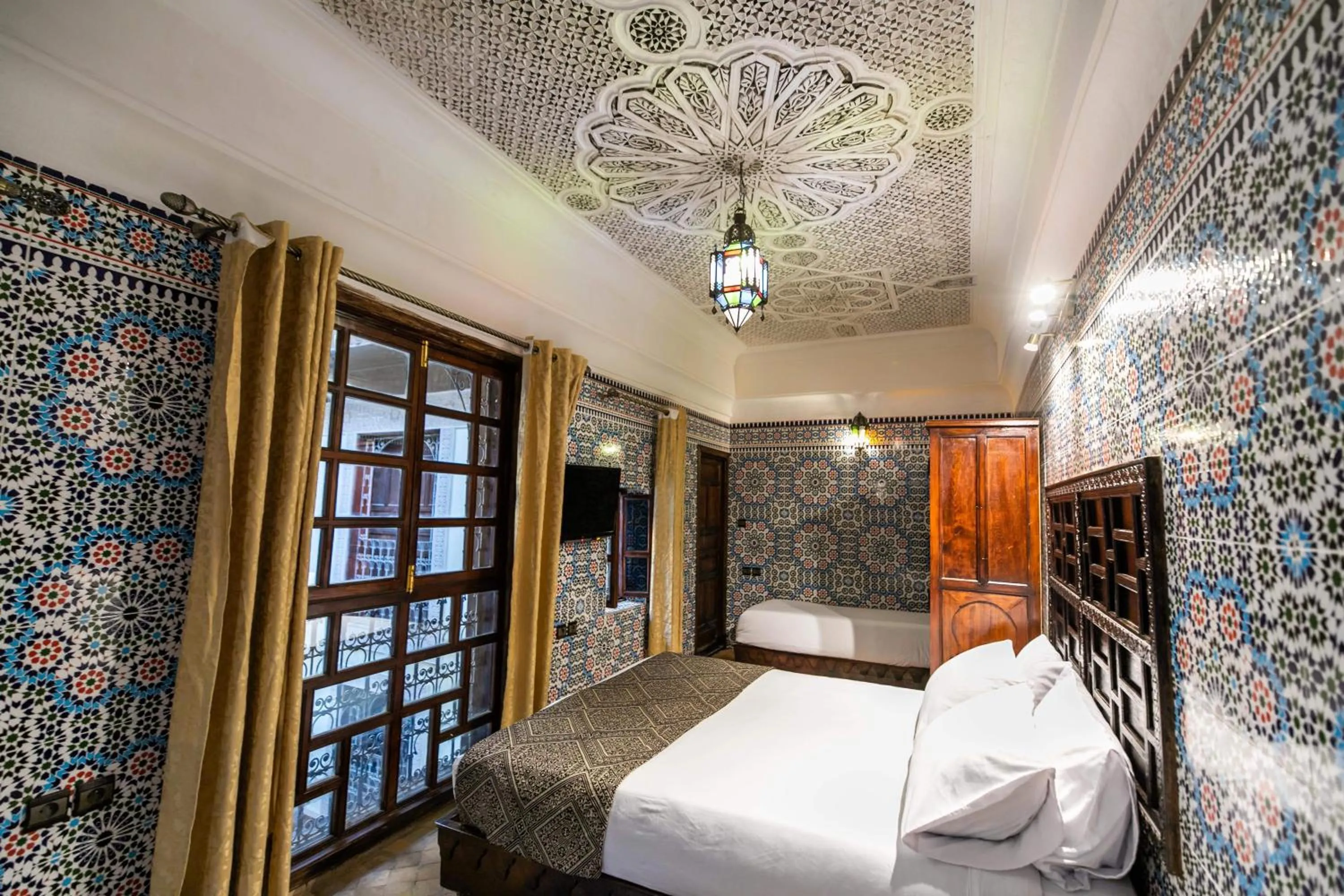 Bed in Riad Fes Aicha & SPA