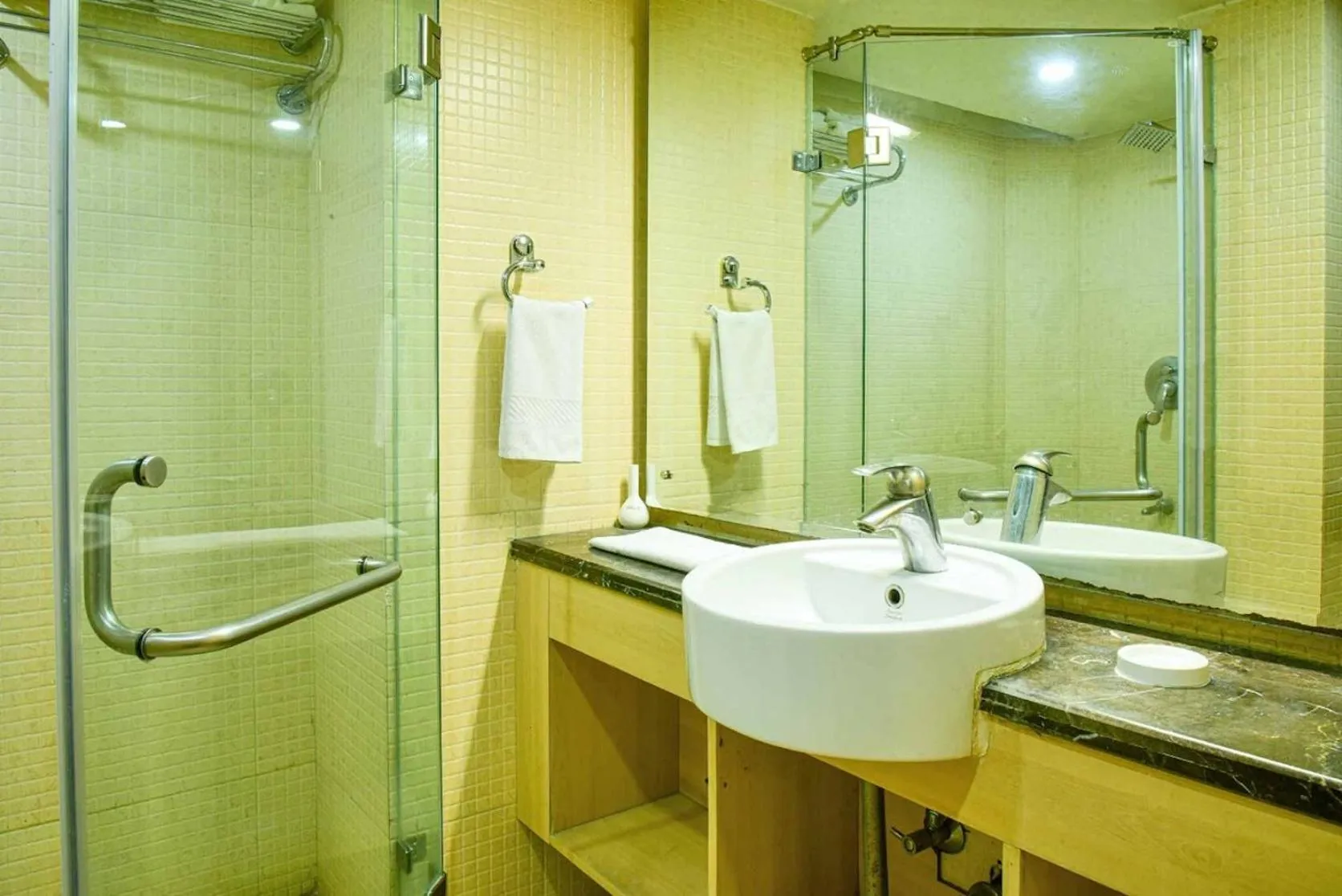 Bathroom in Quality Inn Residency