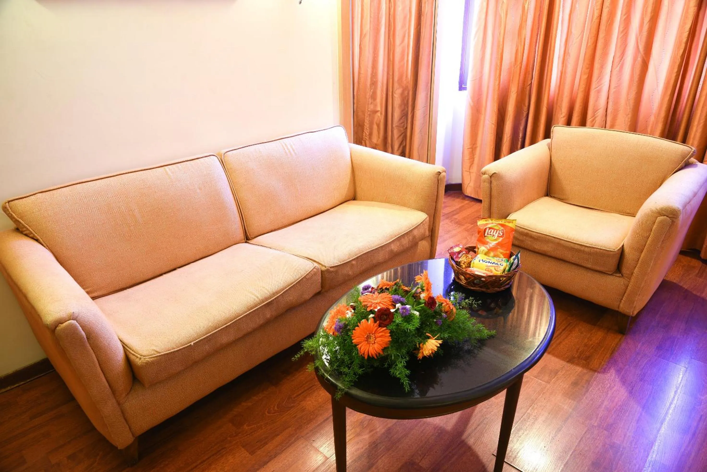 Living room in Quality Inn Residency