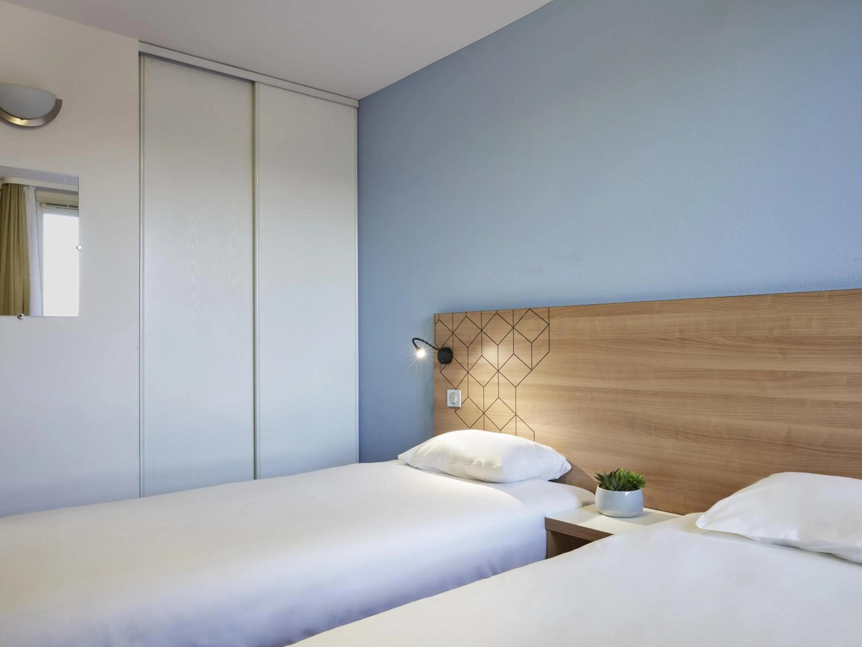 Bedroom, Bed in Aparthotel Adagio Access Paris Quai d'Ivry