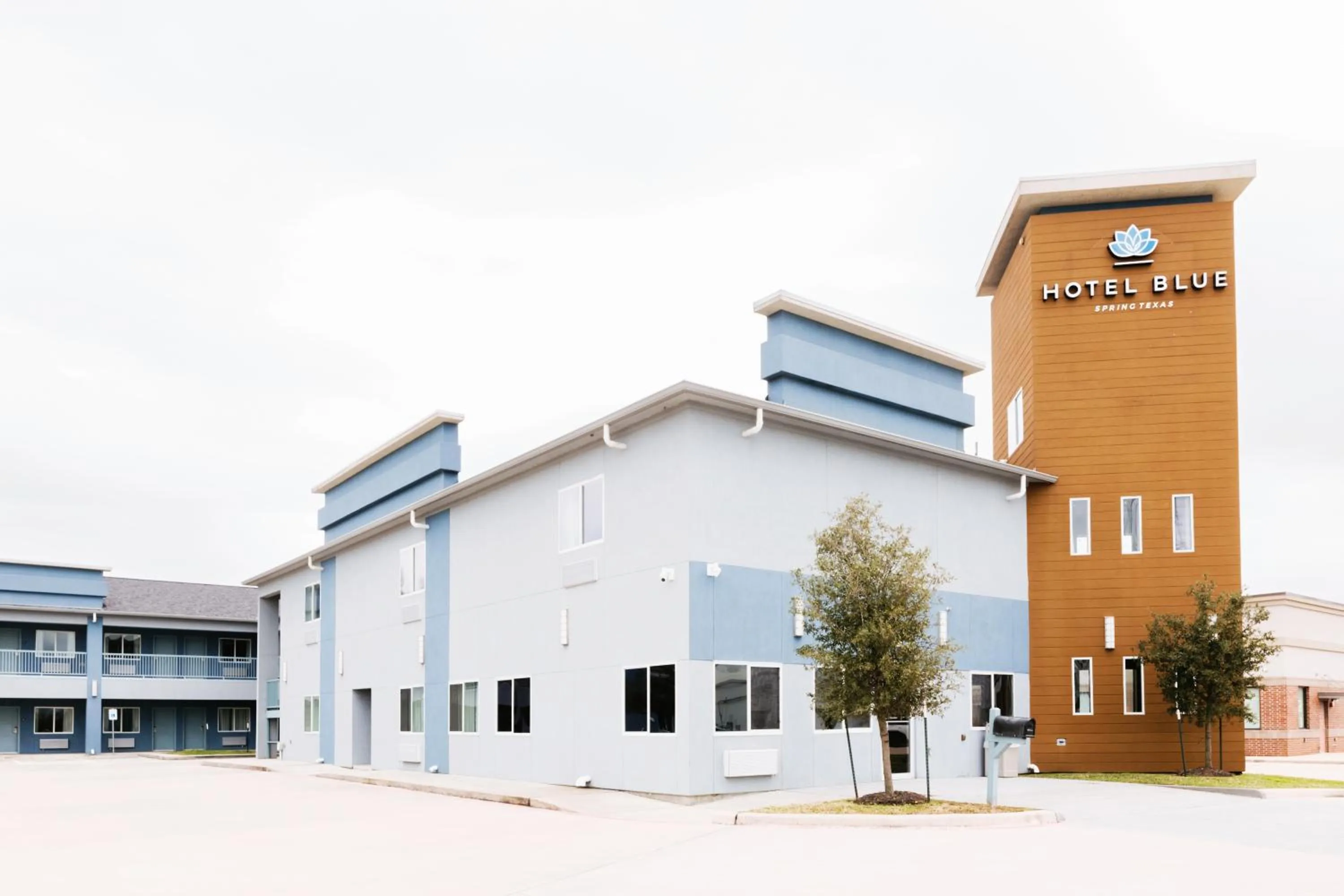 Property building in Super 8 by Wyndham Spring/North Houston