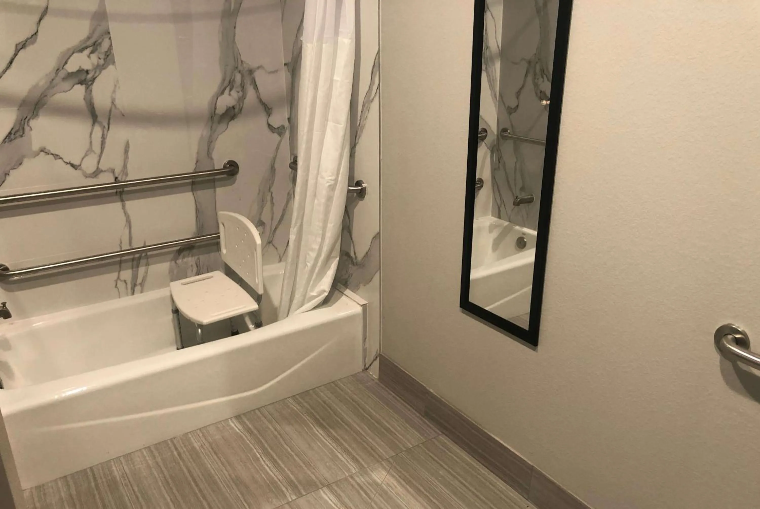 Bathroom in Super 8 by Wyndham Spring/North Houston