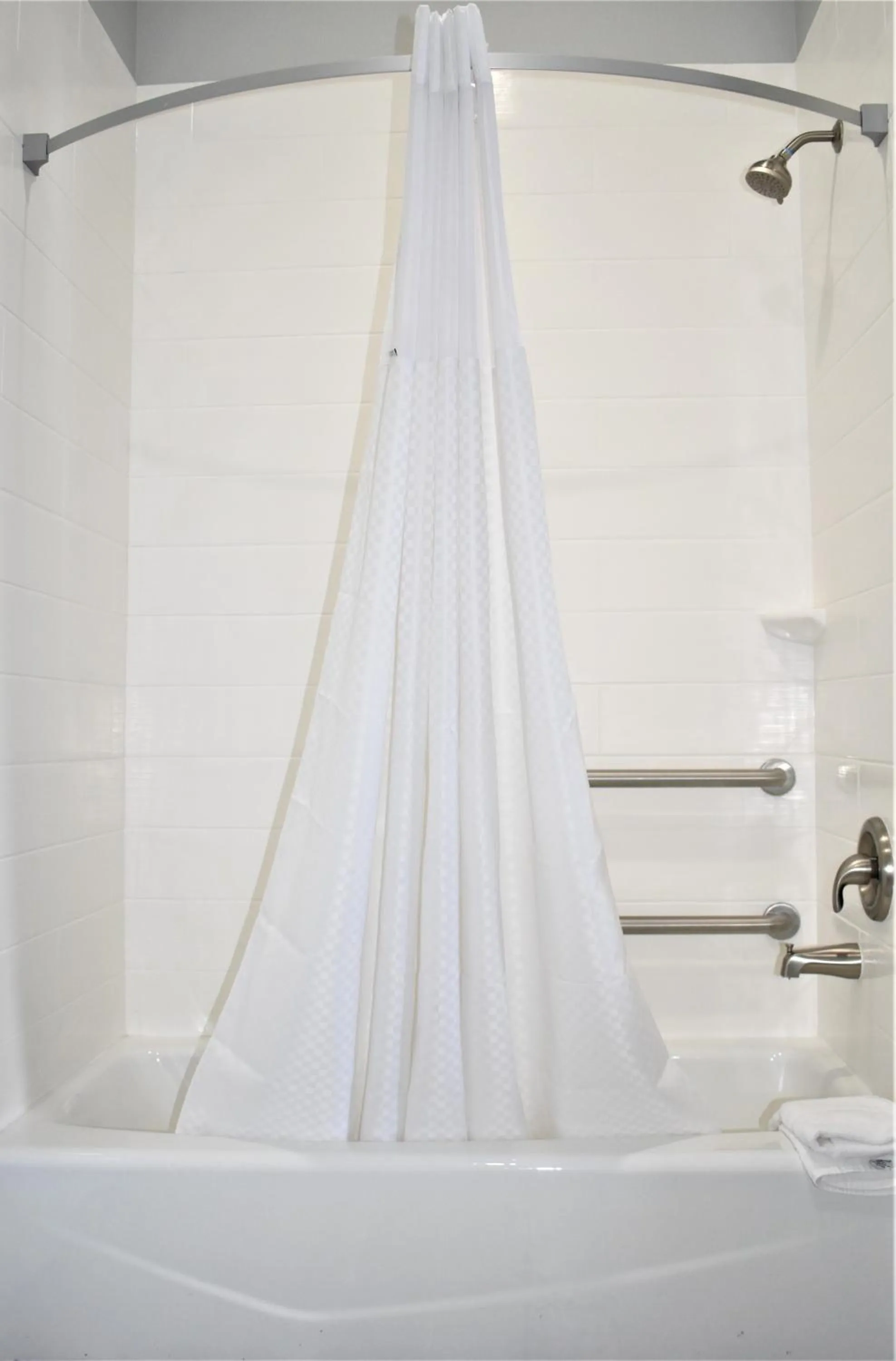 Bathroom in Days Inn & Suites by Wyndham Downtown/University of Houston