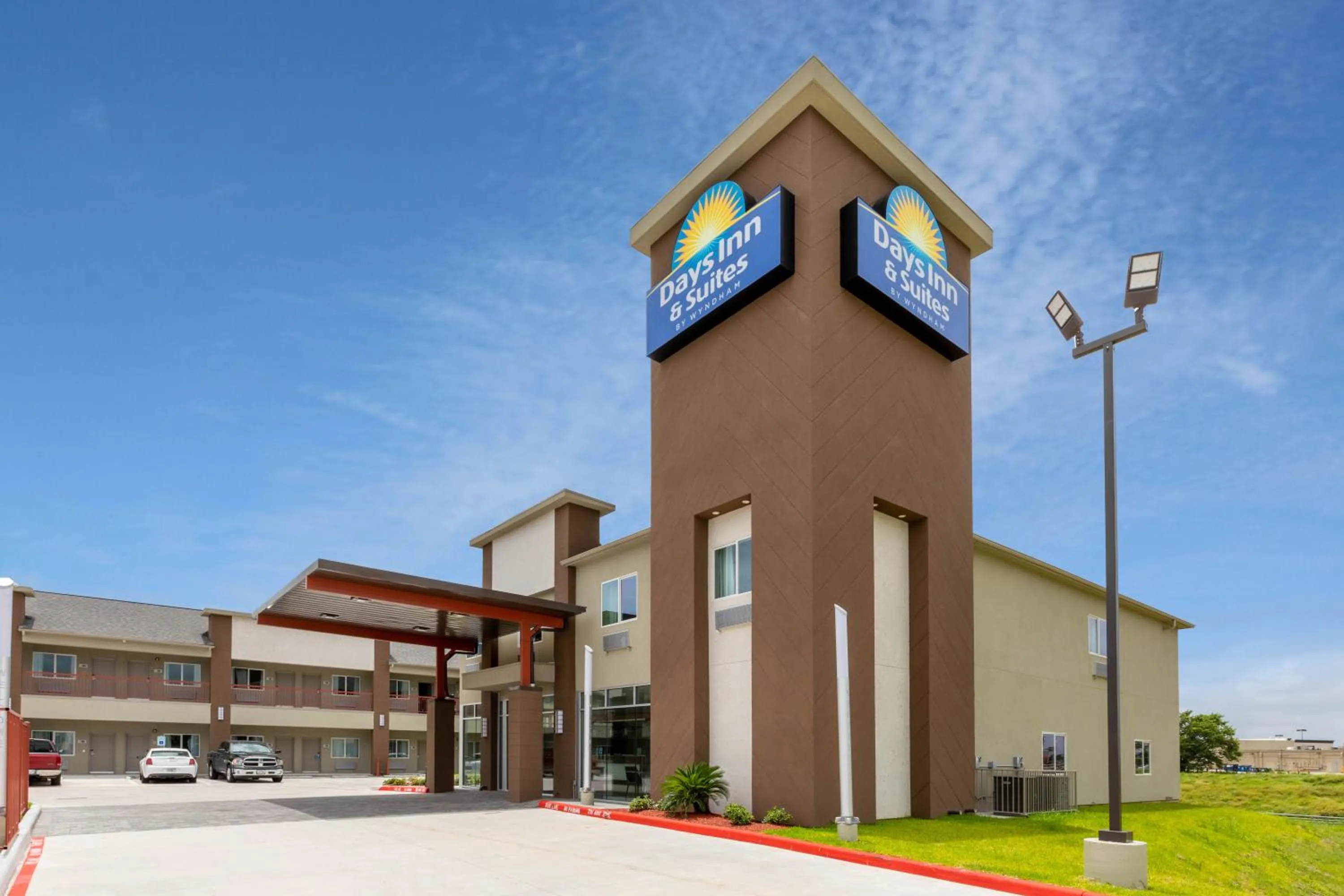 Property building in Days Inn & Suites by Wyndham Downtown/University of Houston