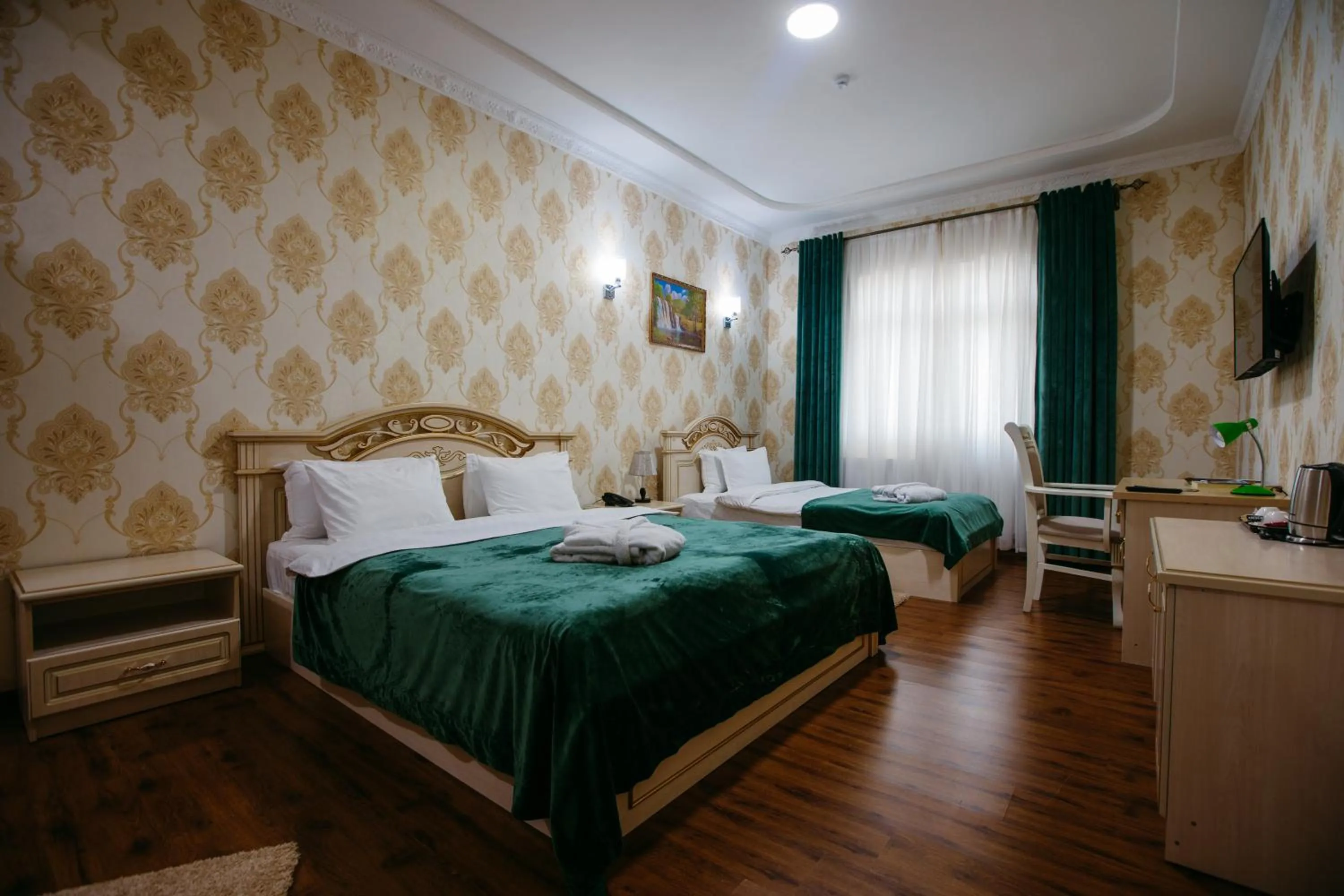 Bed in GRAND HOTEL SOGDIANA