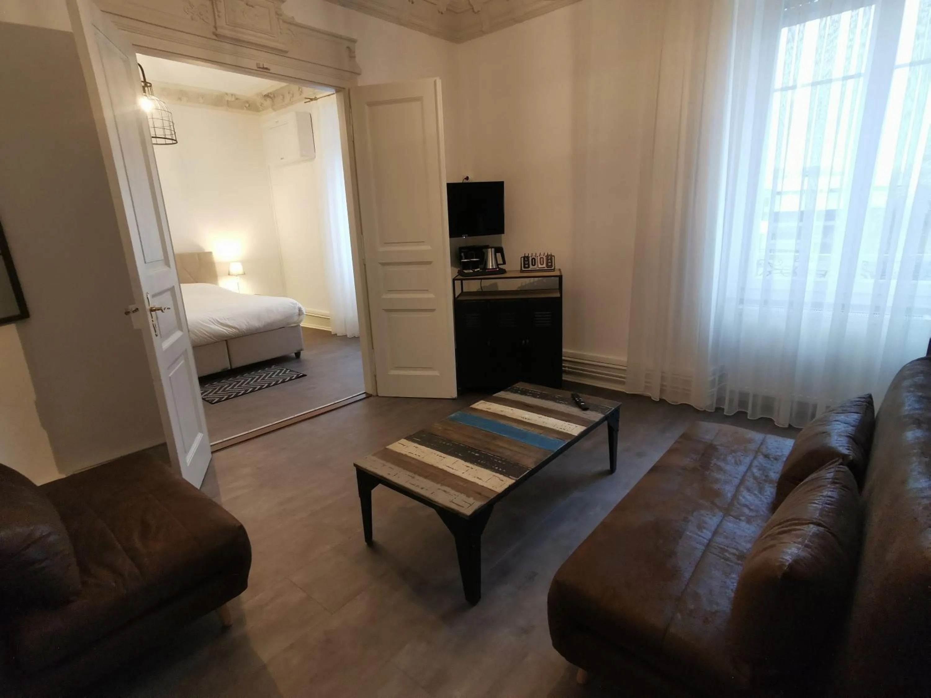 Communal lounge/ TV room, Bed in Colmar Suites - Résidence