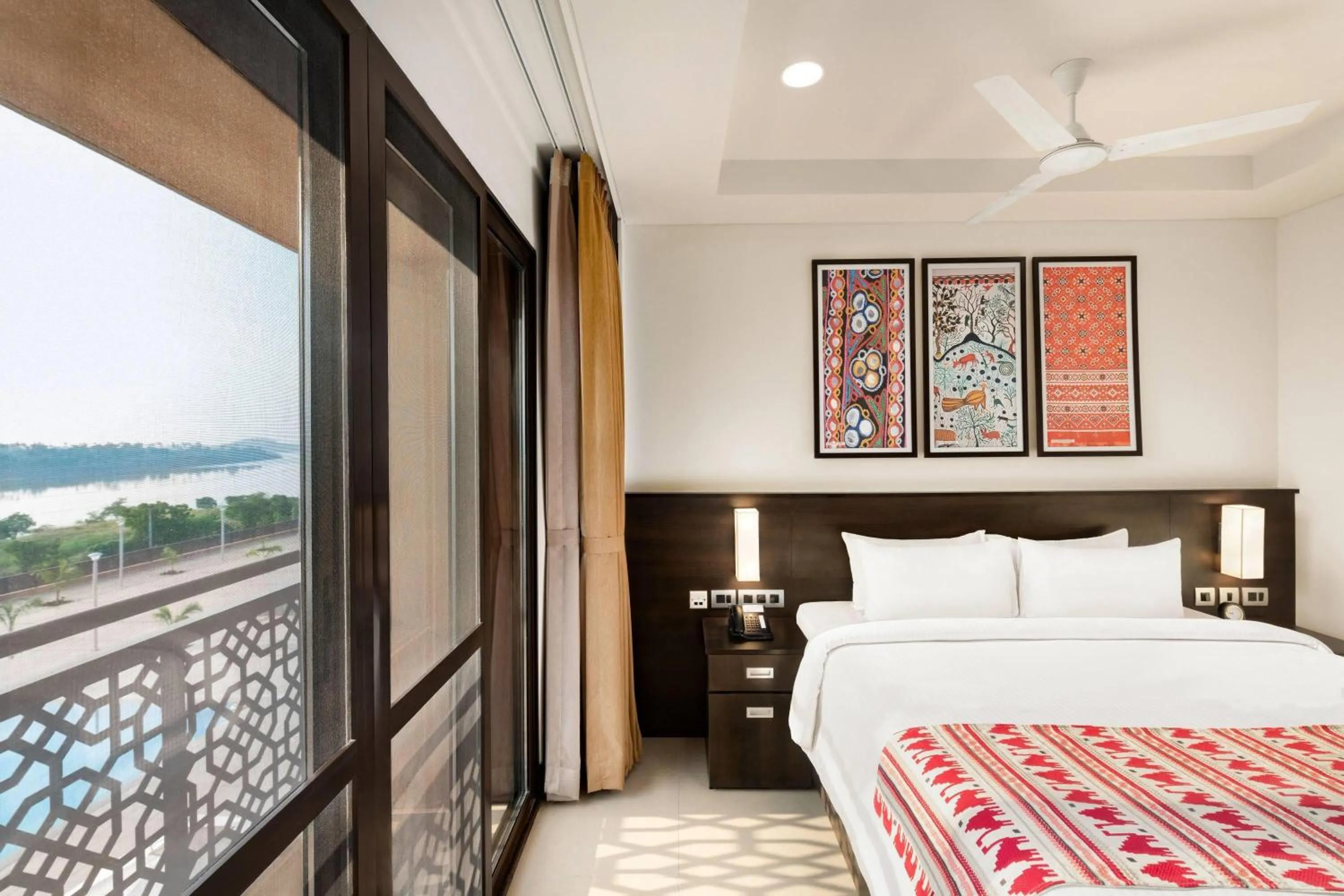 Photo of the whole room, Bed in Ramada Encore by Wyndham Statue of Unity