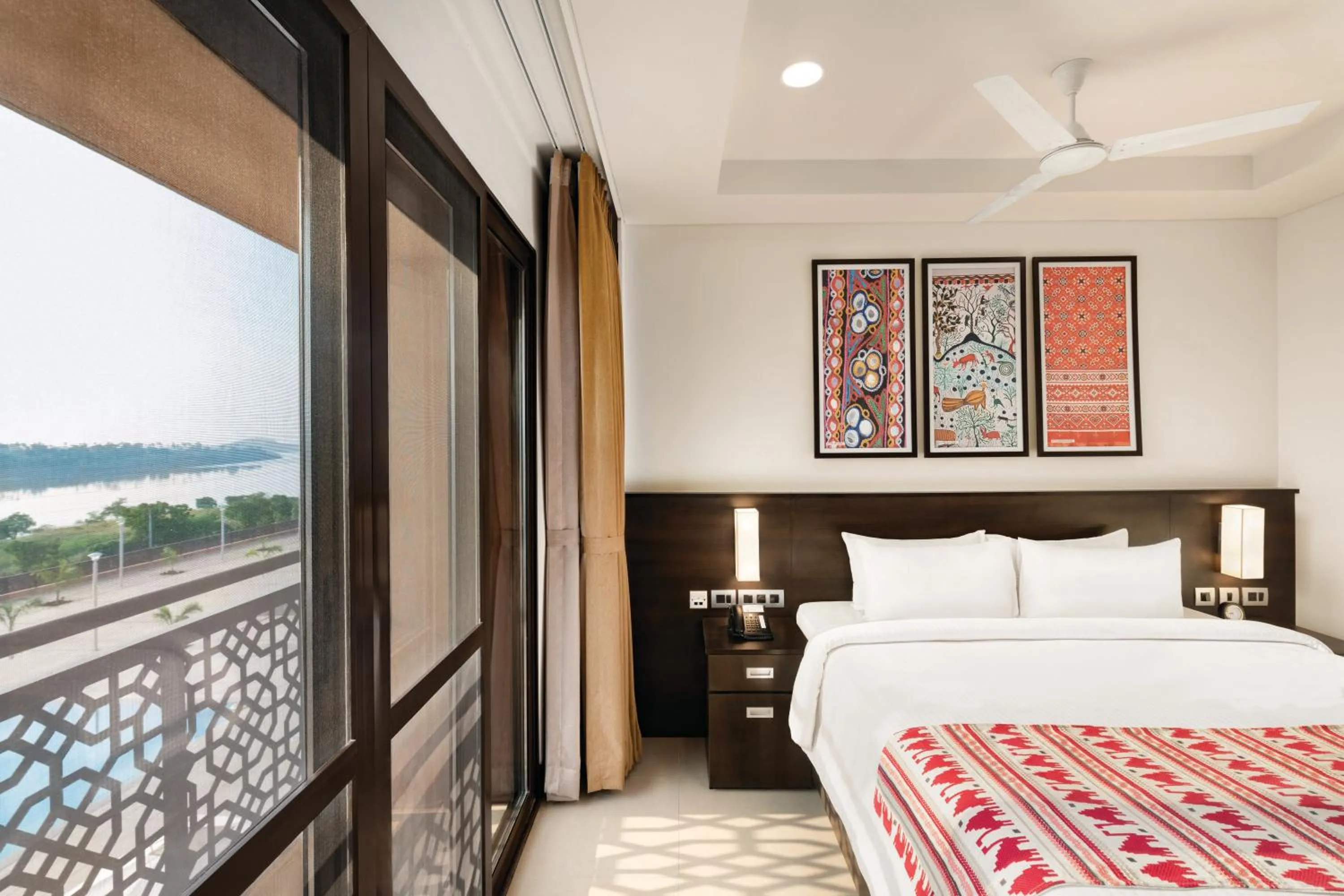 Photo of the whole room, Bed in Ramada Encore by Wyndham Statue of Unity