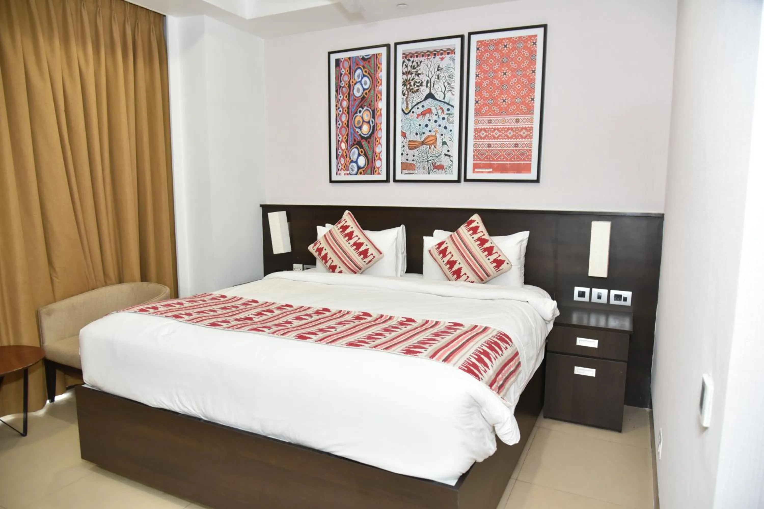 Photo of the whole room, Bed in Ramada Encore by Wyndham Statue of Unity