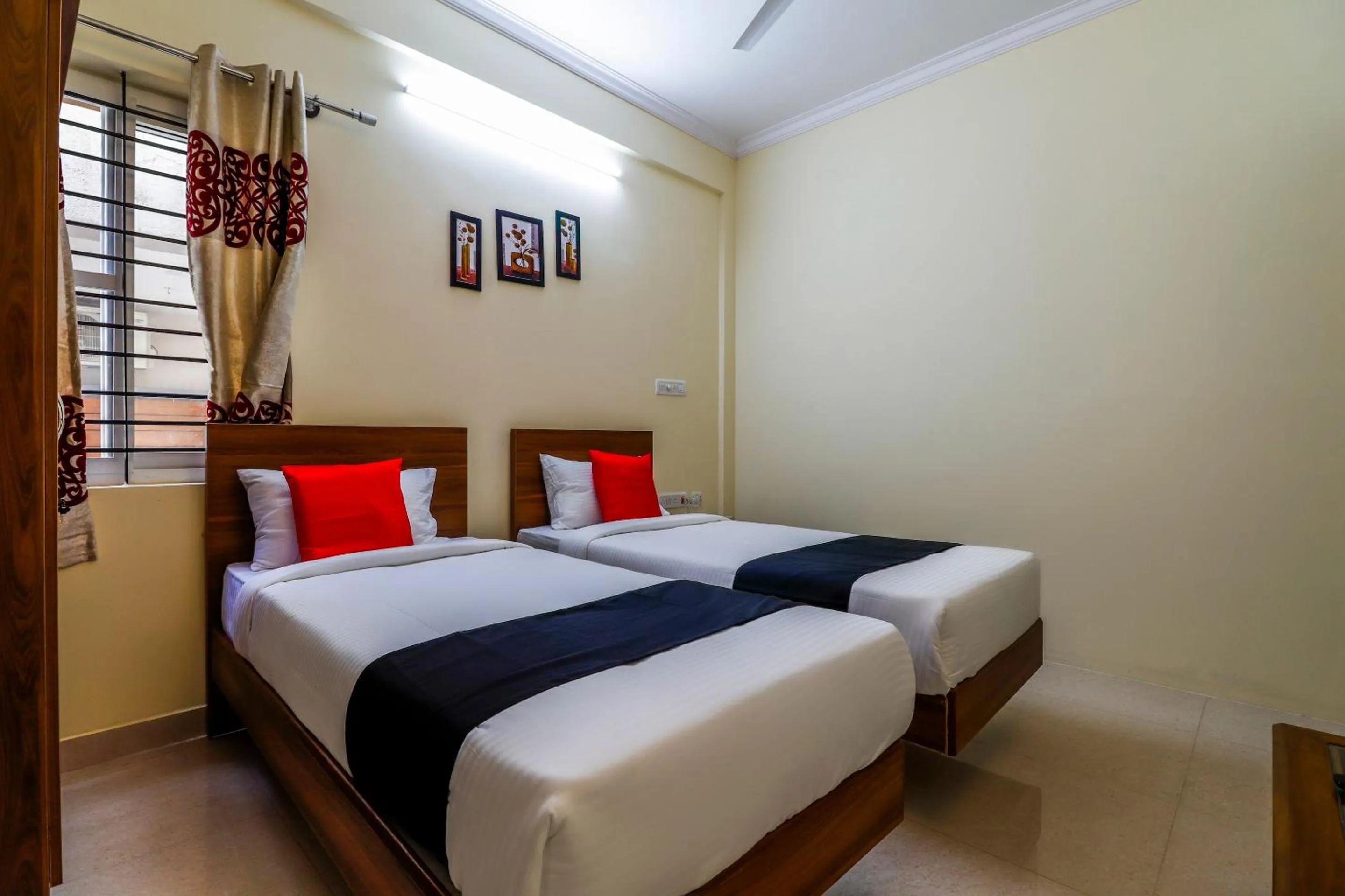 Bedroom, Bed in Capital O SLN Residency