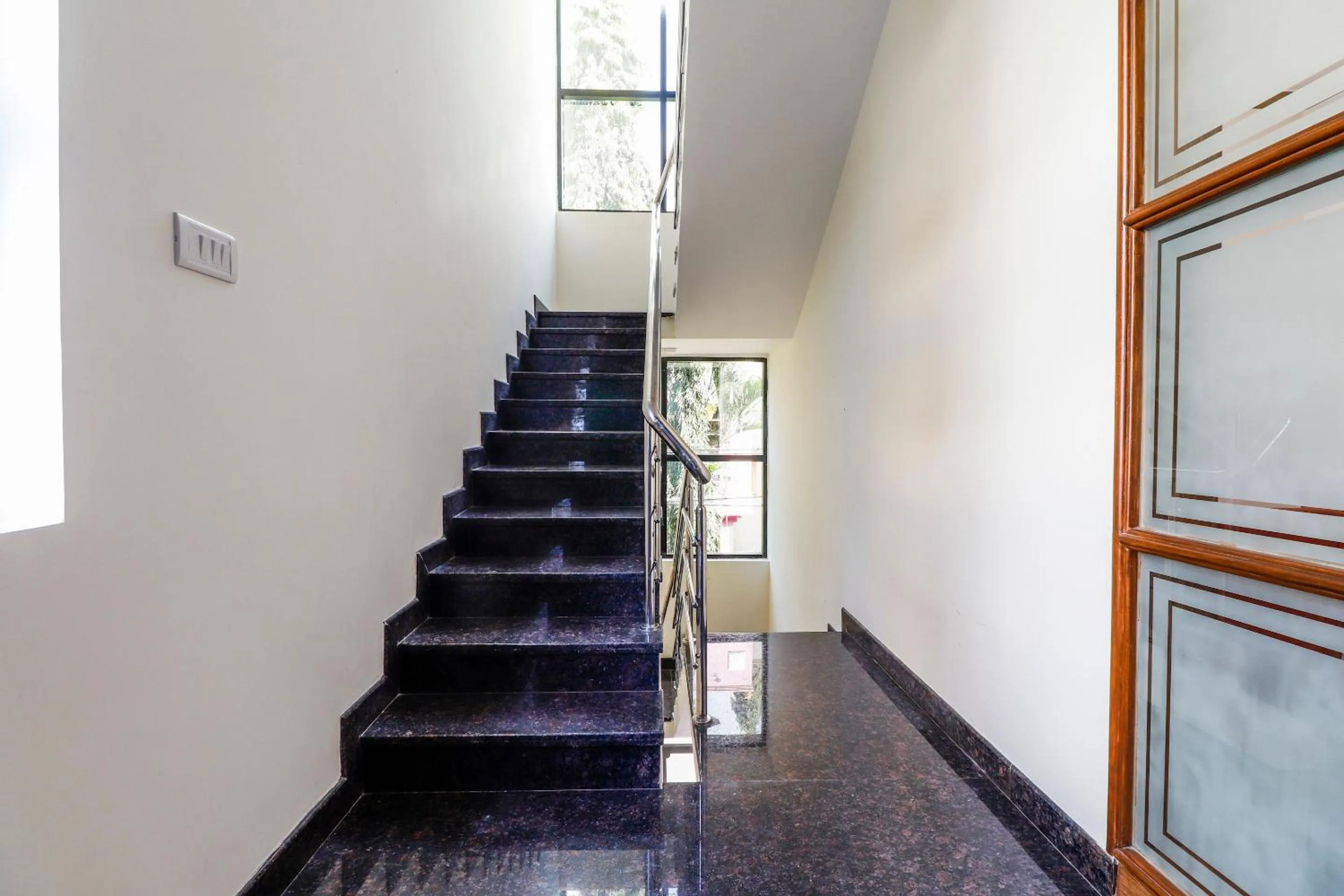 Lobby or reception in Capital O SLN Residency