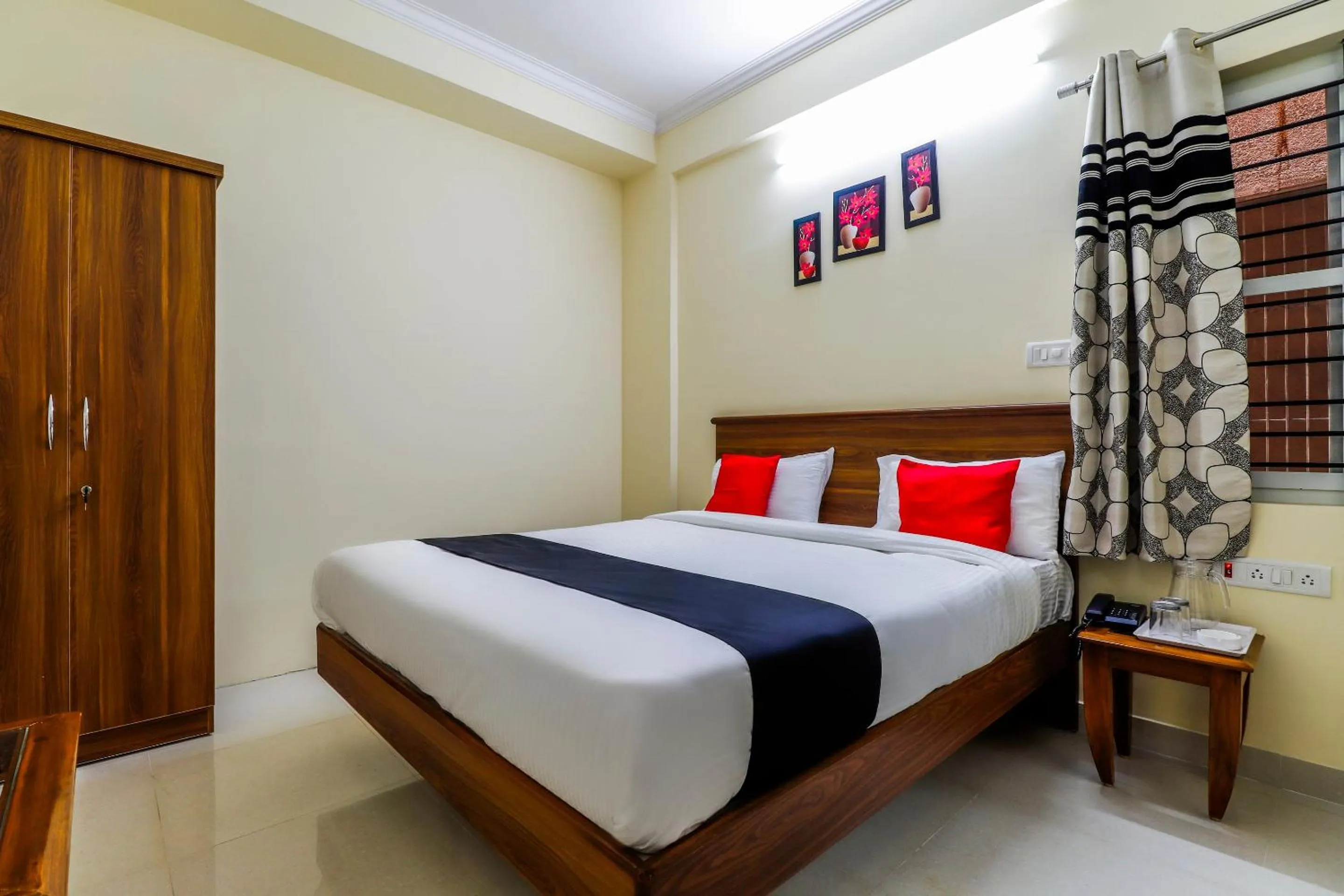 Bedroom, Bed in Capital O SLN Residency