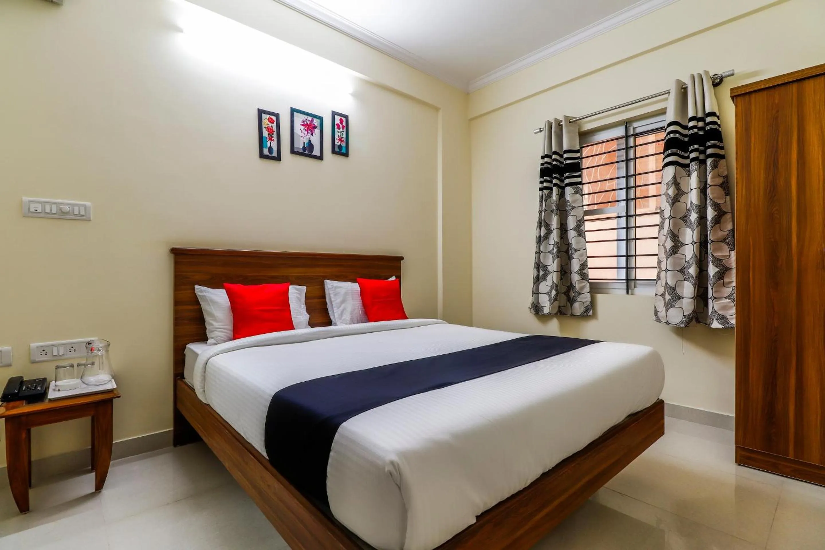 Bedroom, Bed in Capital O SLN Residency