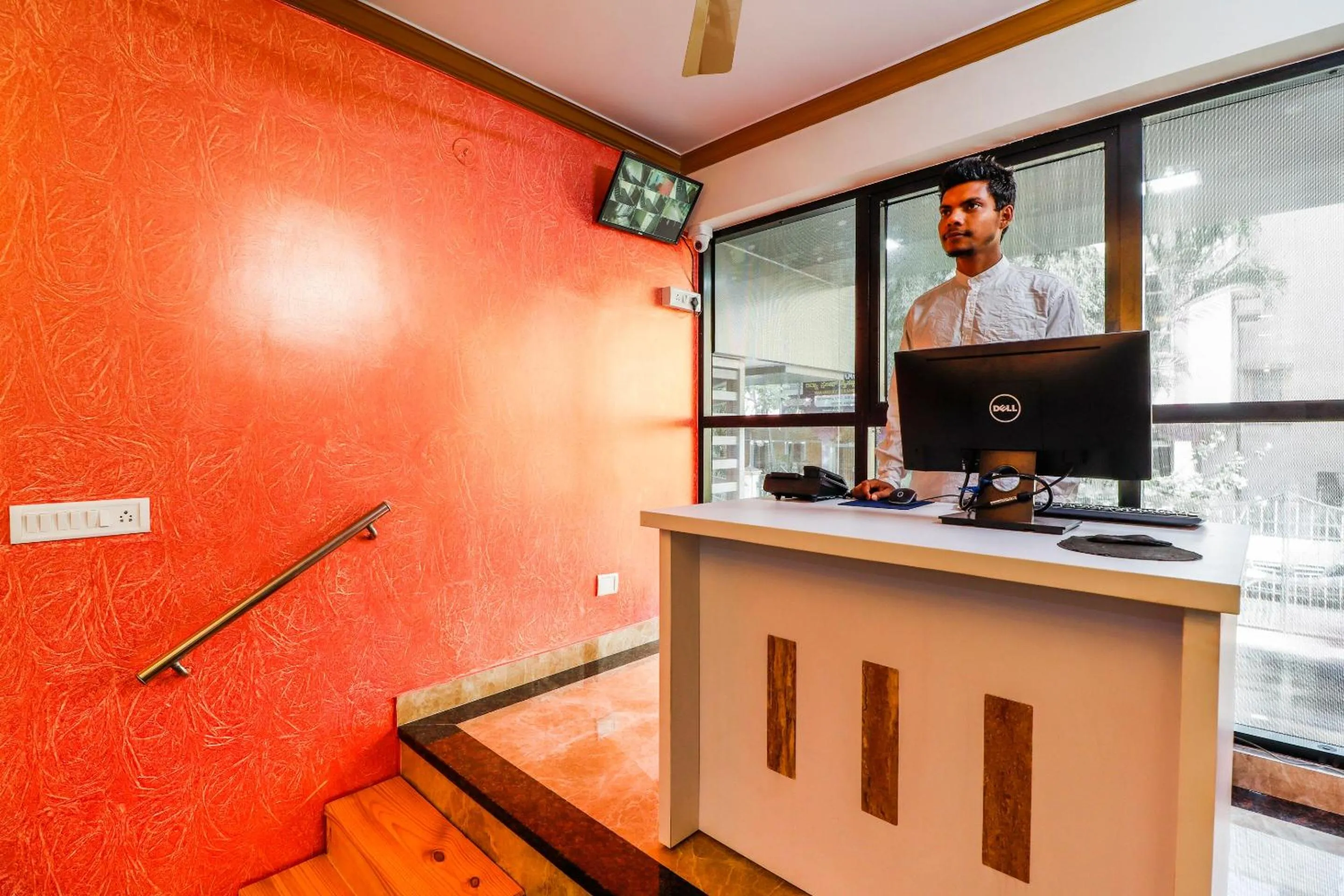 Lobby or reception in Capital O SLN Residency