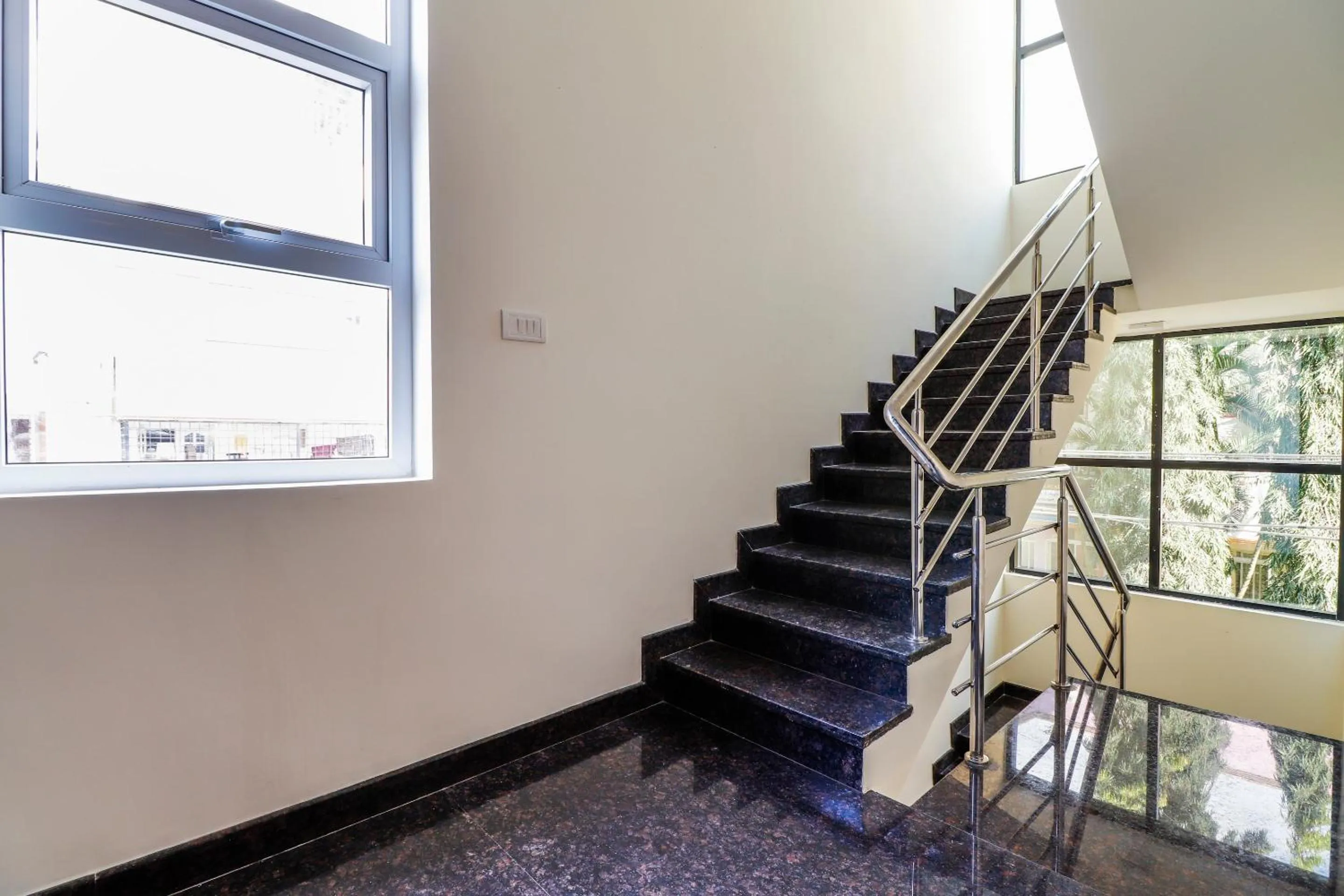 Lobby or reception in Capital O SLN Residency