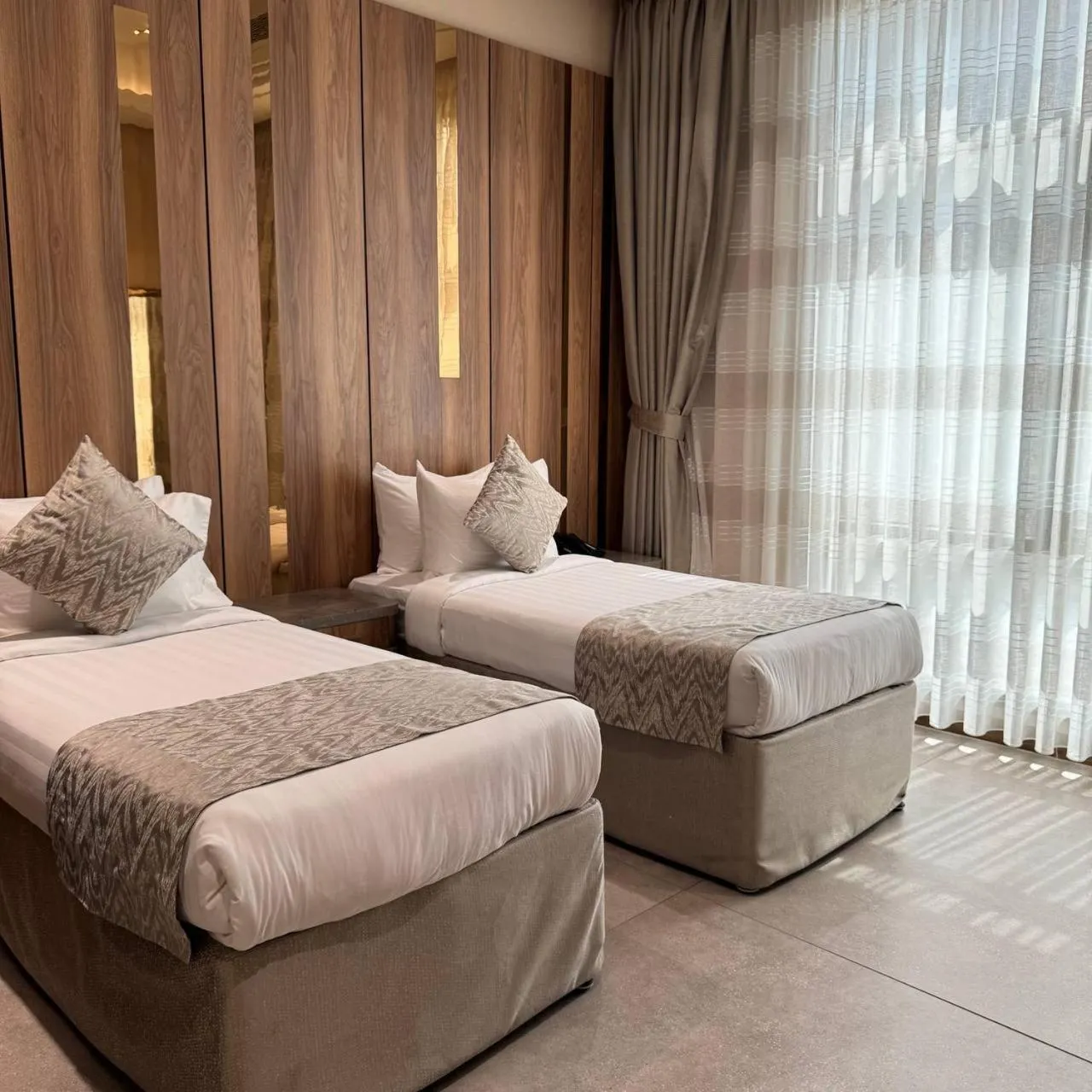 Bed in Midan Hotel & Suites Al Aziziya