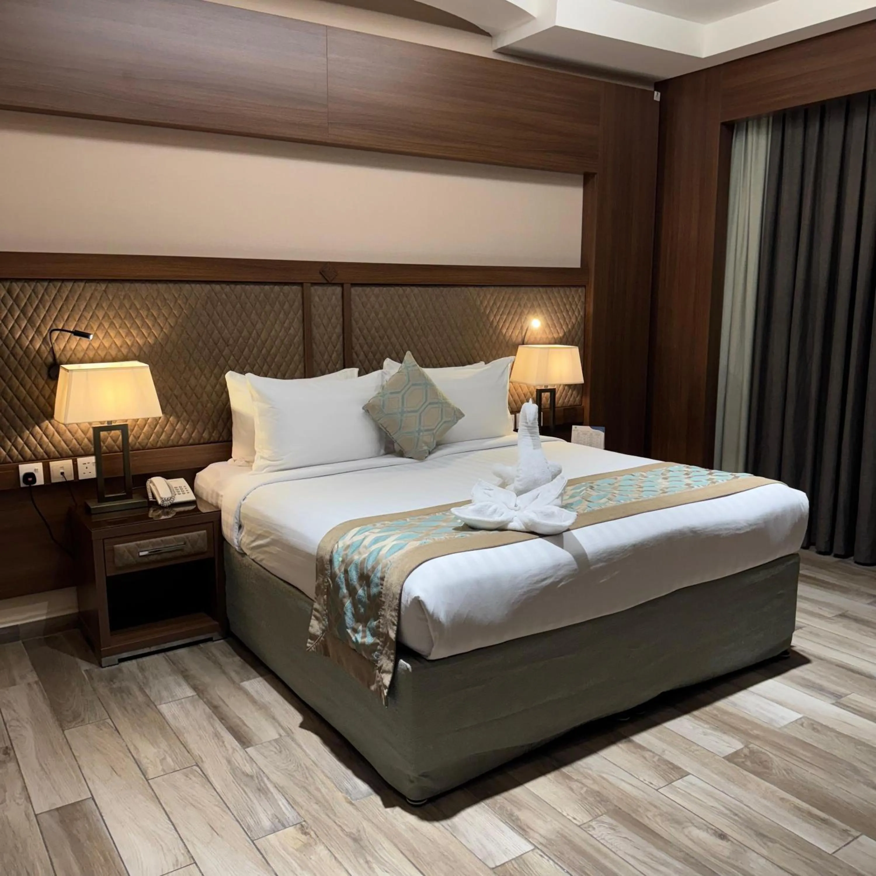 Bedroom, Bed in Midan Hotel & Suites Al Aziziya