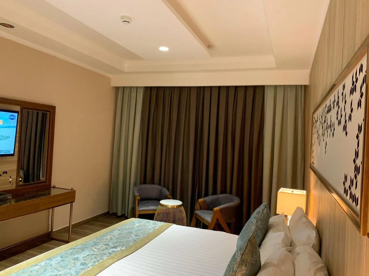 Bedroom, Bed in Midan Hotel & Suites Al Aziziya