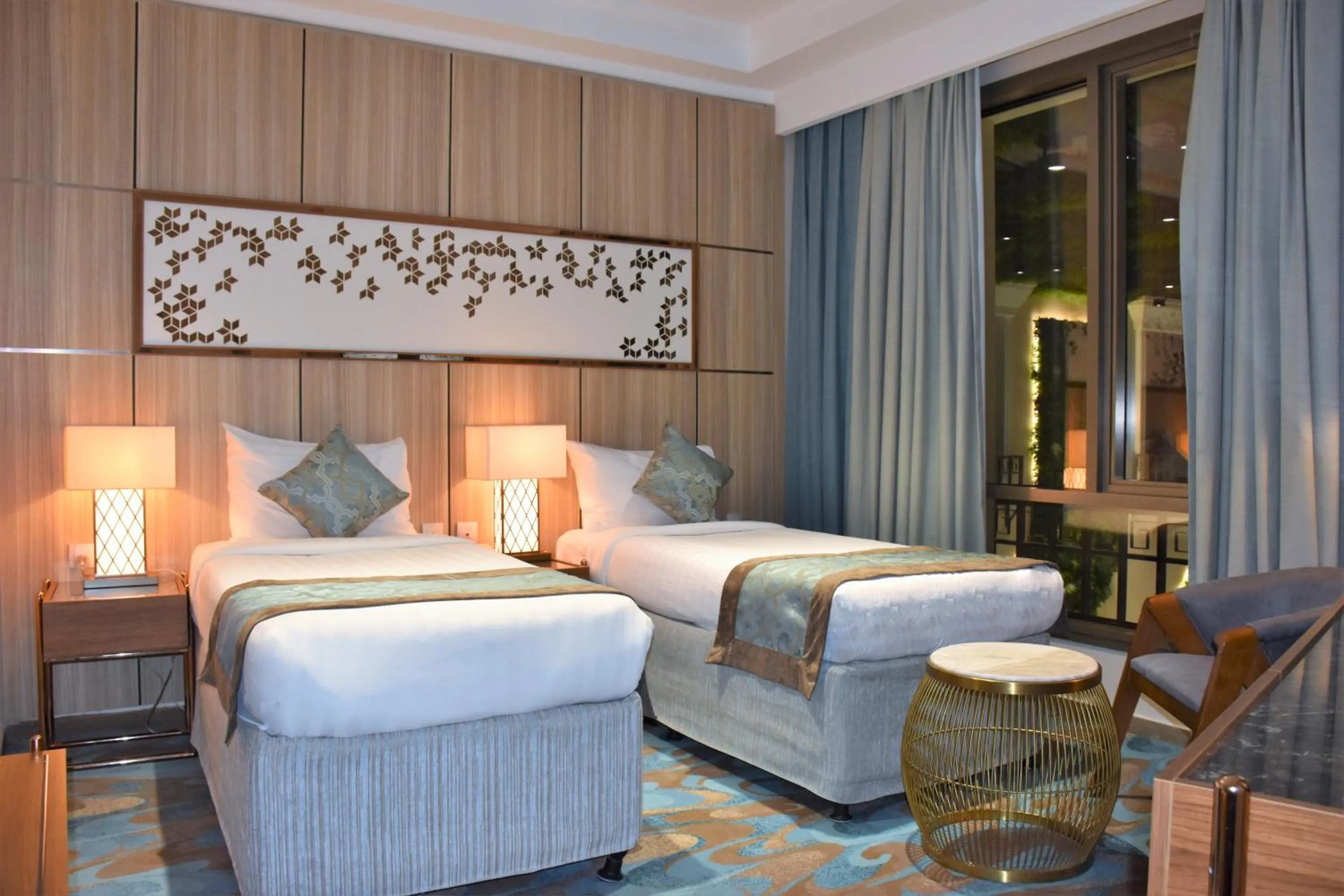 Bedroom, Bed in Midan Hotel & Suites Al Aziziya