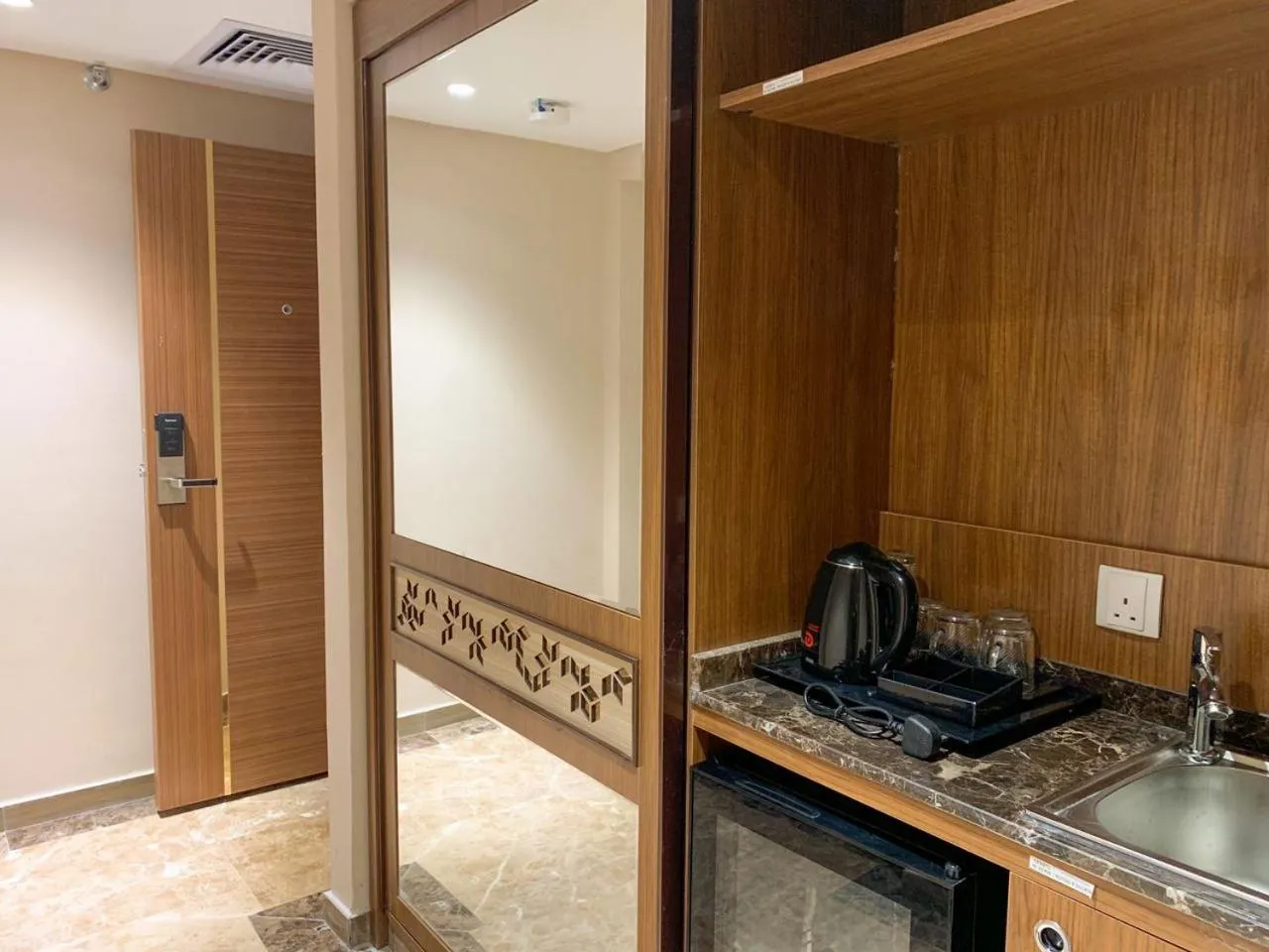 Bedroom in Midan Hotel & Suites Al Aziziya