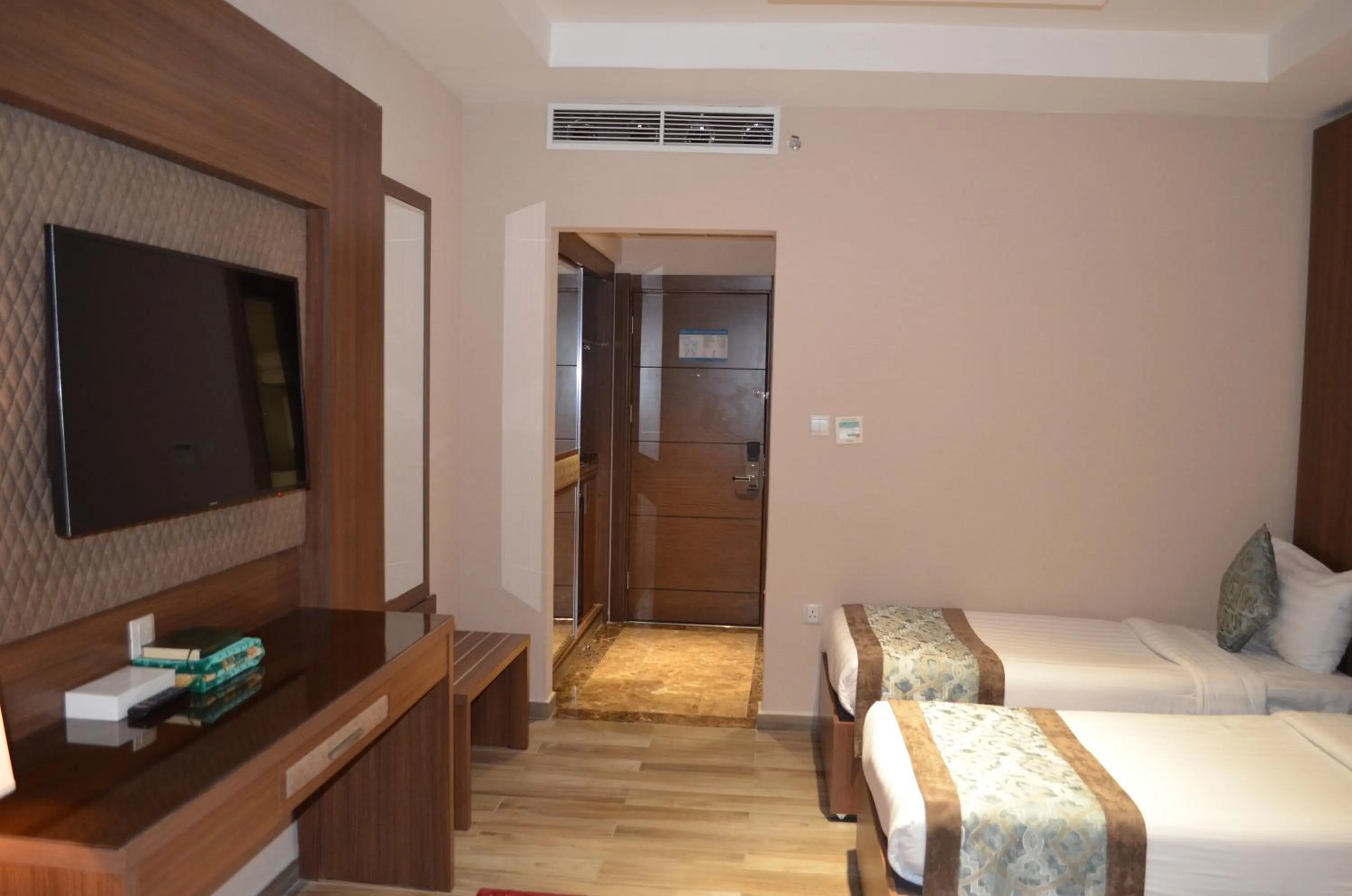 Bedroom, Bed in Midan Hotel & Suites Al Aziziya