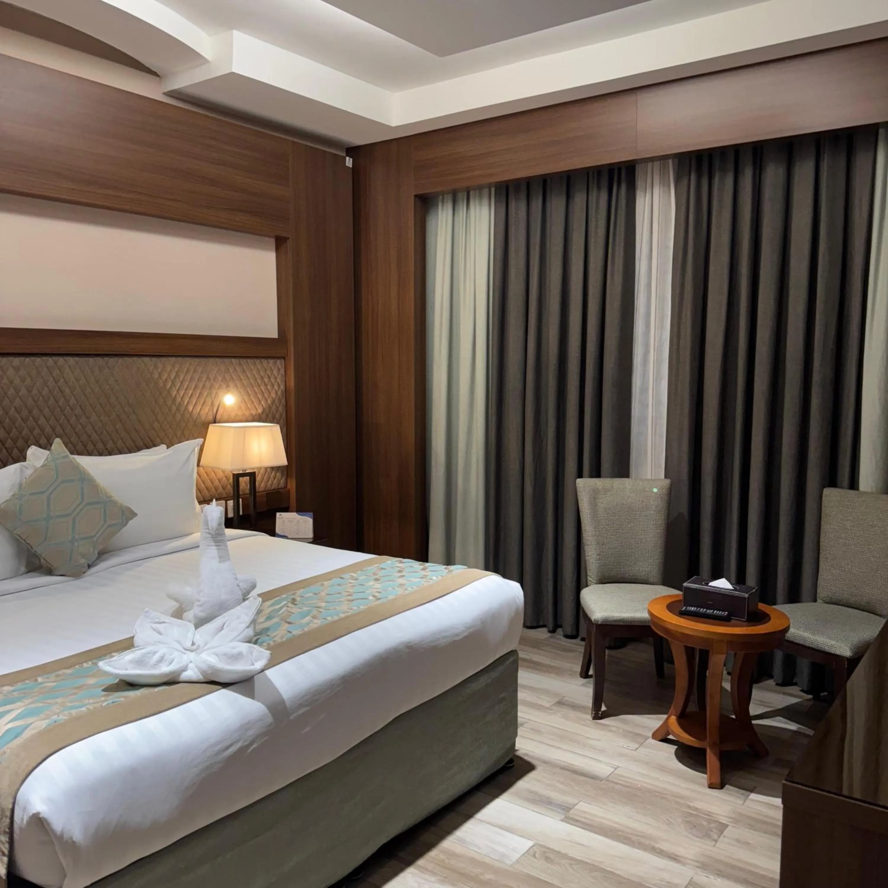 Photo of the whole room, Bed in Midan Hotel & Suites Al Aziziya