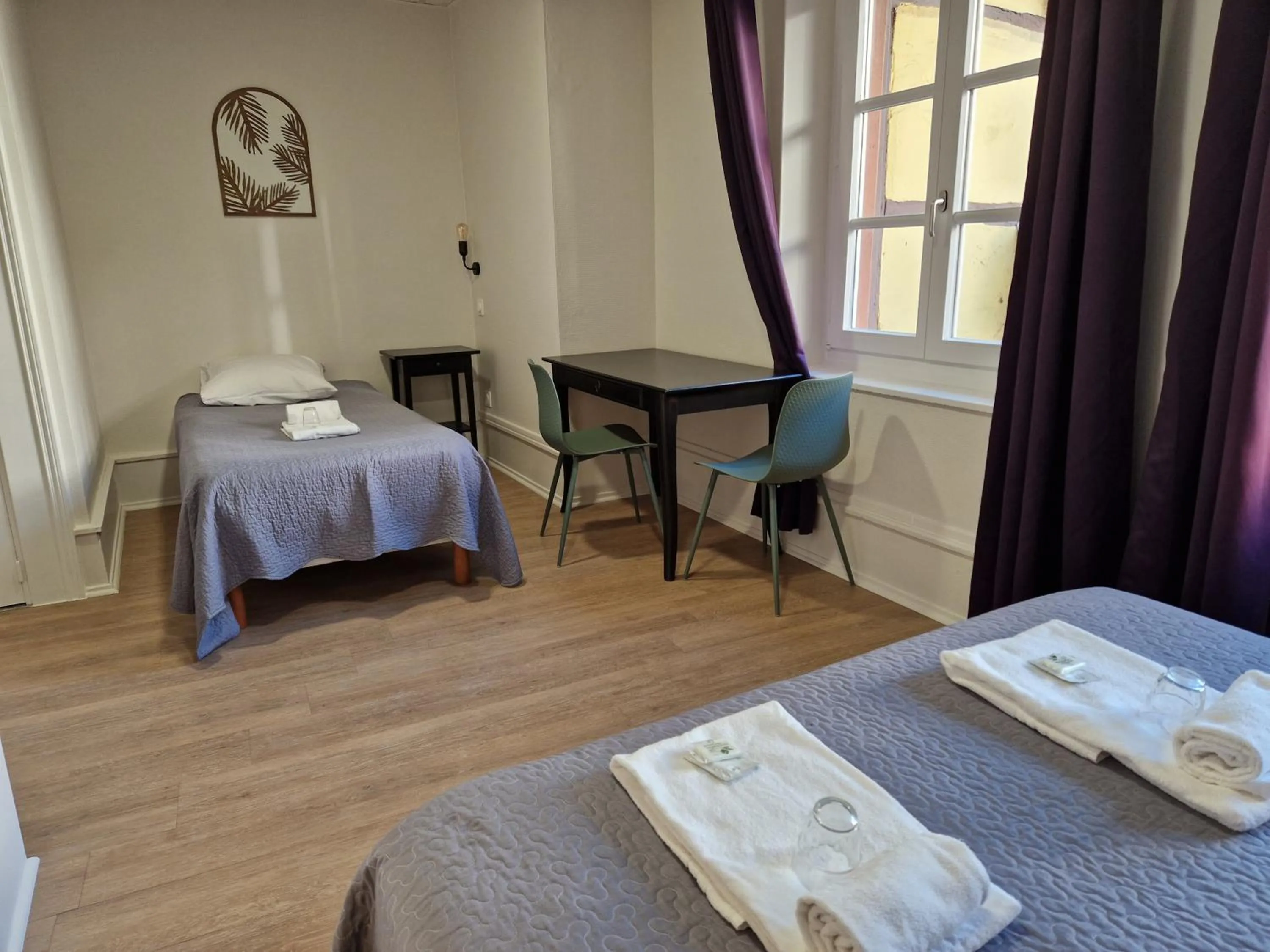 Bed in Hôtel Patricia - Strasbourg Hyper Centre