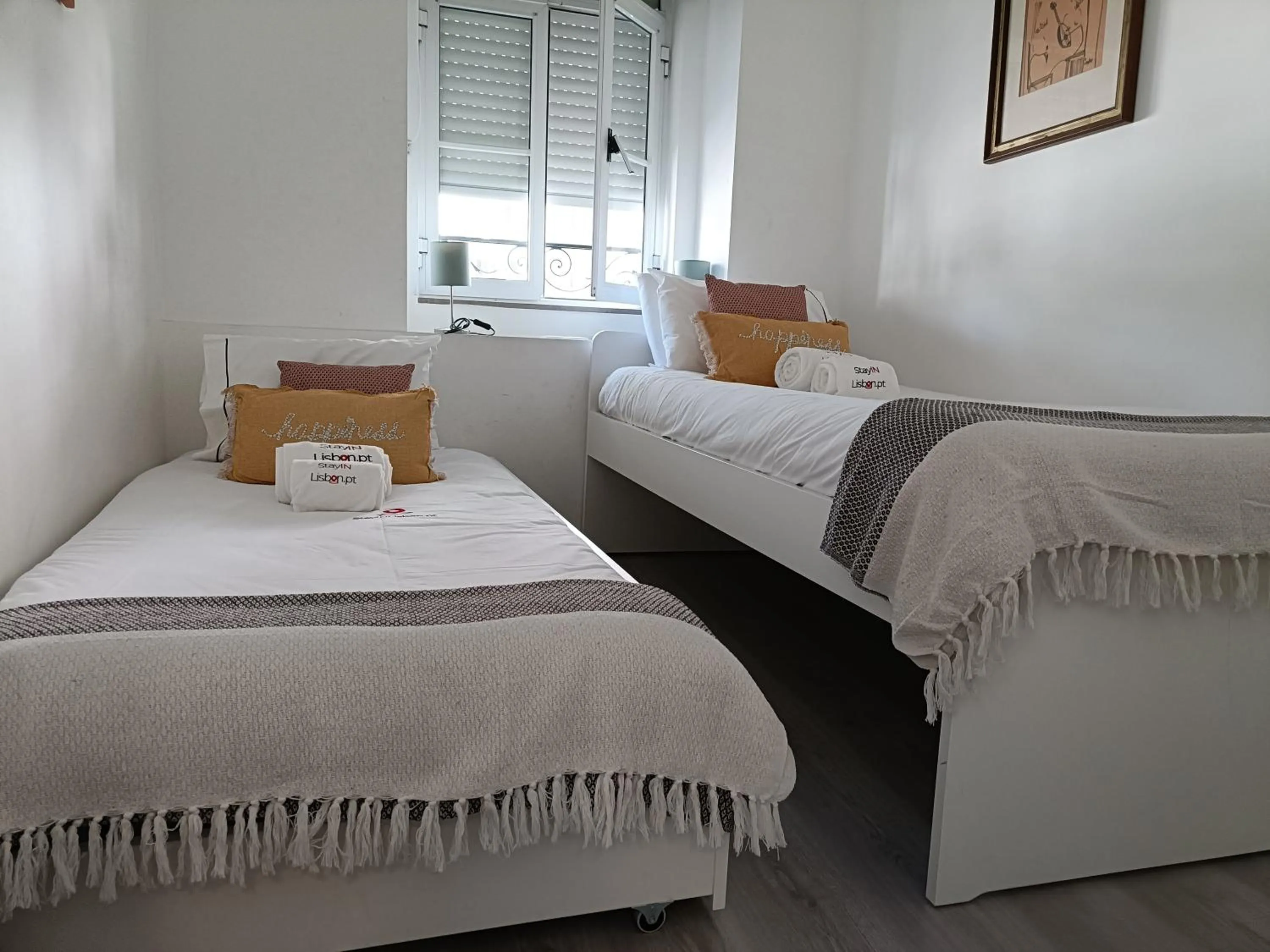 Bed in DoBairro Suites at Merces