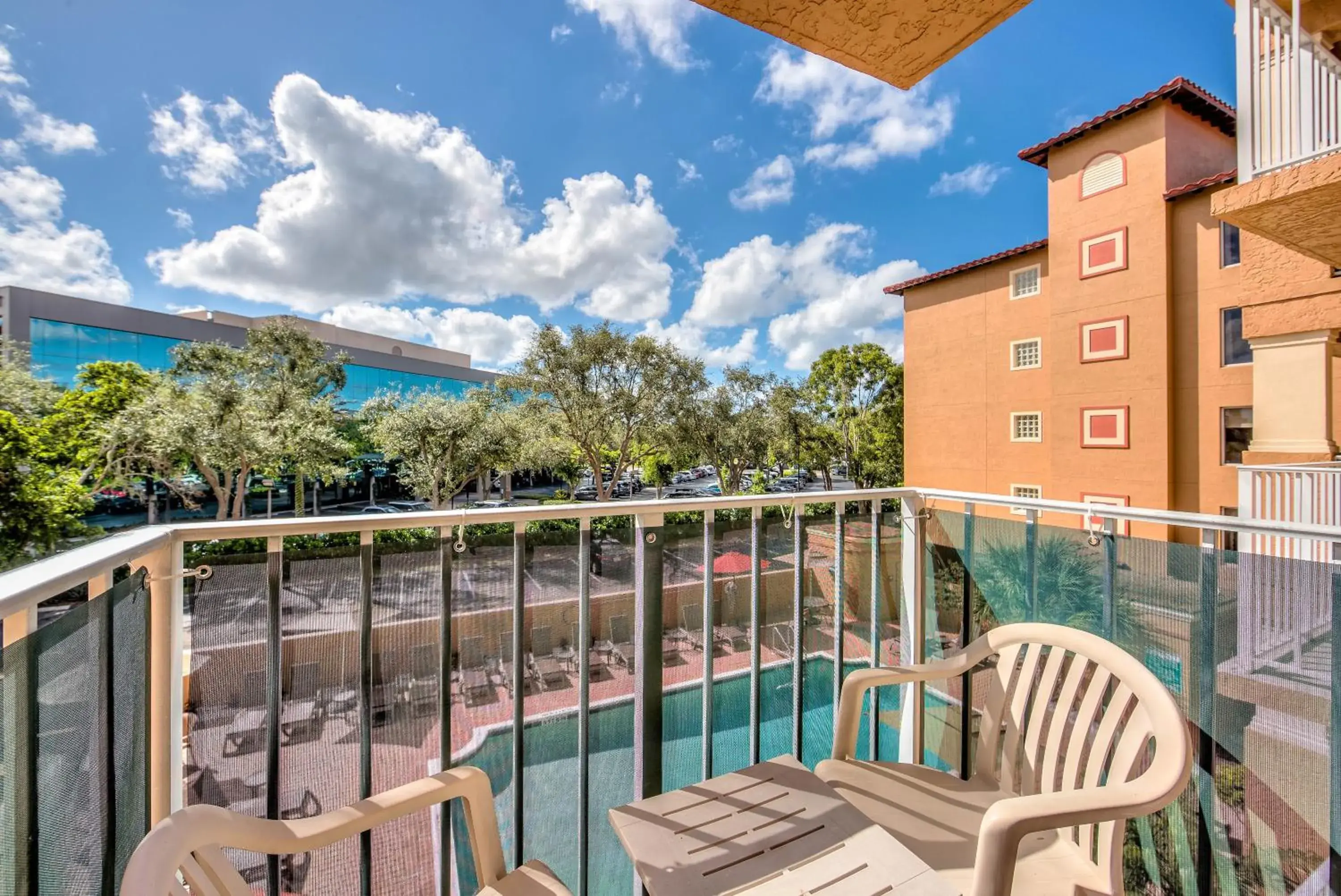 Double Room with Double Beds and Balcony - Pool View in Inn of Naples, Tapestry Collection by Hilton Double Room with Double Beds and Balcony - Pool View in Inn of Naples, Tapestry Collection by Hilton
