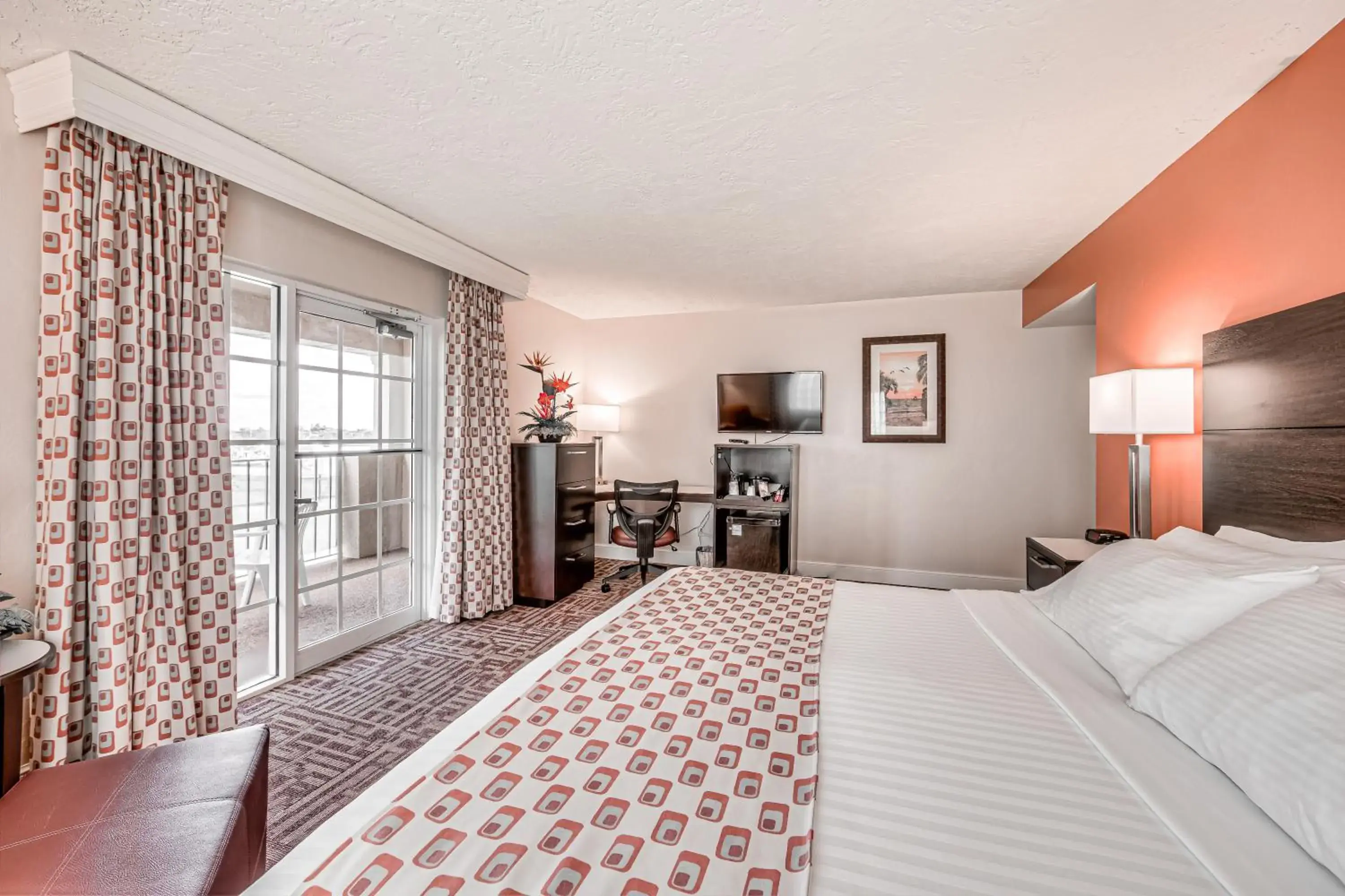 Large King Room with Balcony - Hearing Access in Inn of Naples, Tapestry Collection by Hilton Large King Room with Balcony - Hearing Access in Inn of Naples, Tapestry Collection by Hilton