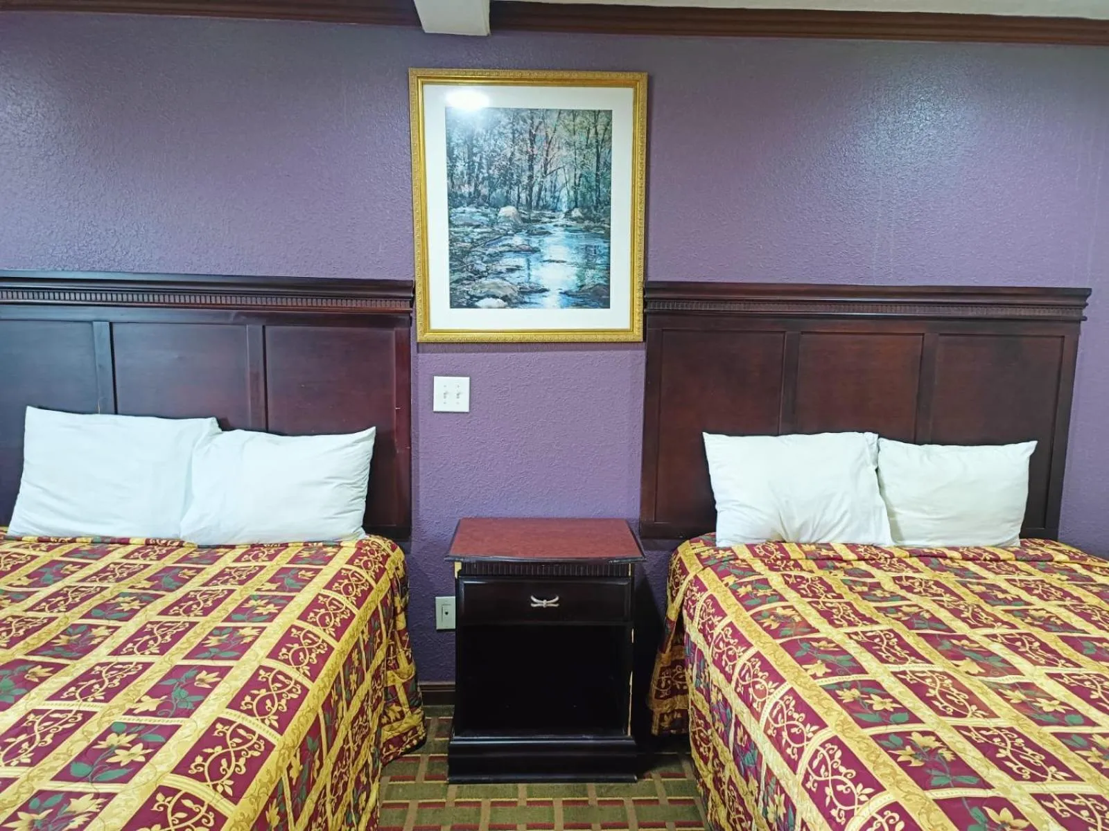 Bedroom, Bed in American Inn & Suites By Capital O Victoria US-59