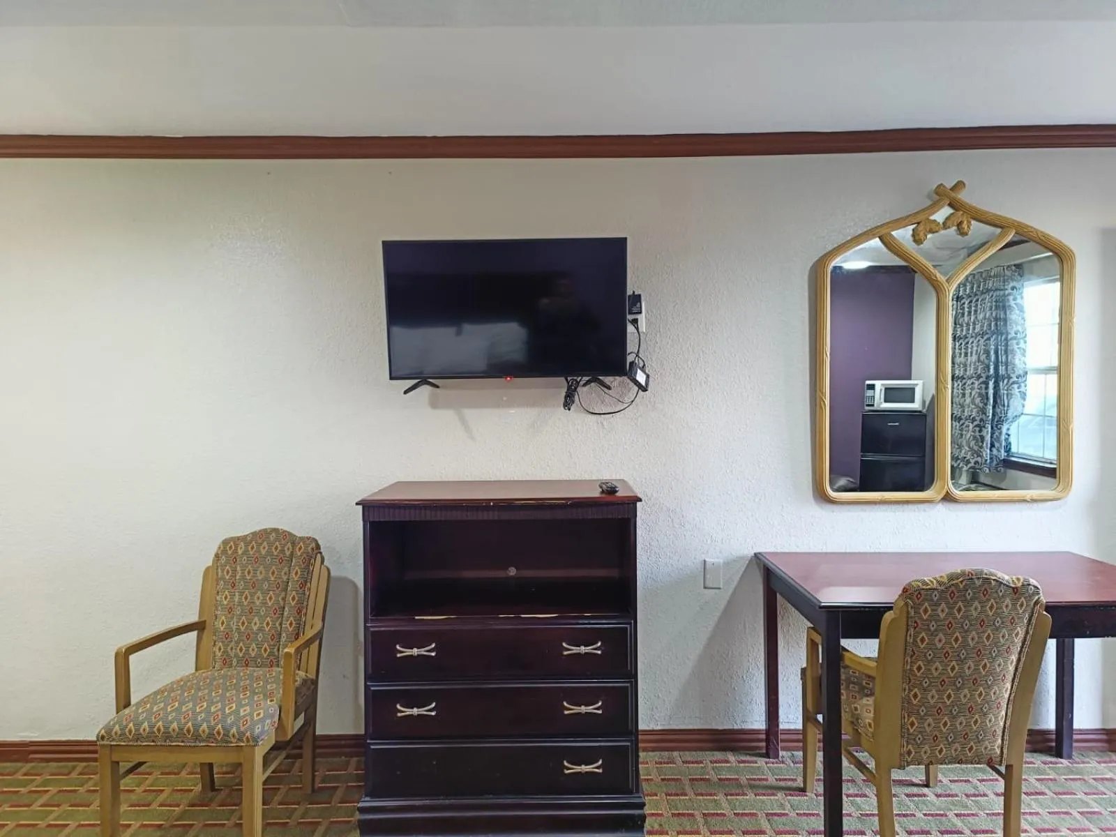 Bedroom in American Inn & Suites By Capital O Victoria US-59