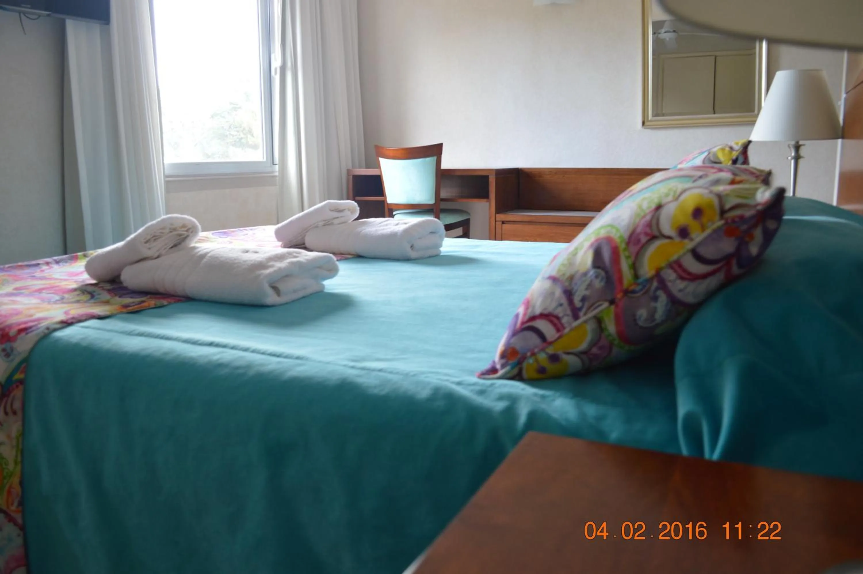 Bed in Hotel Victoria