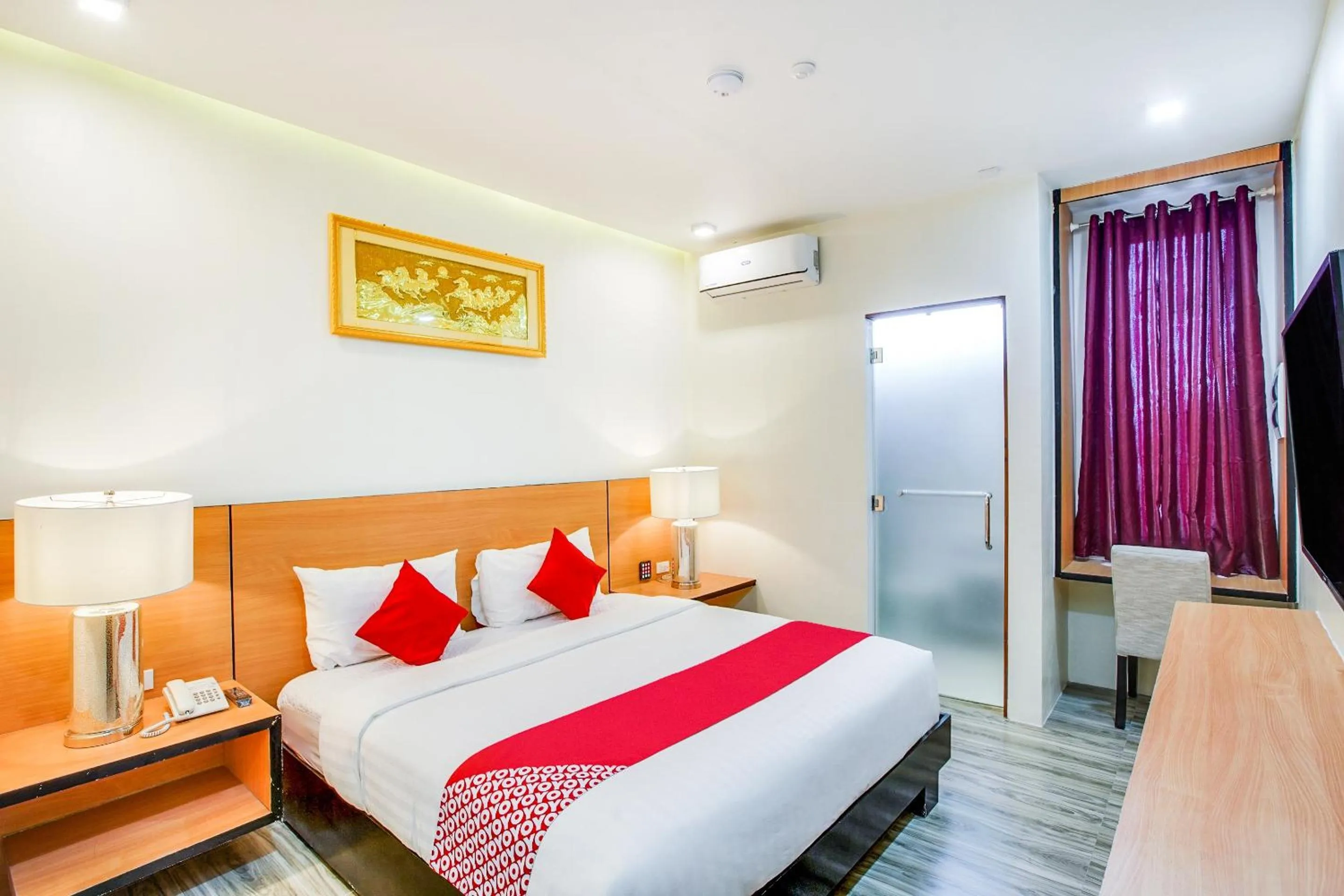 Bedroom, Bed in OYO 489 Casa Mia Hotel Suites