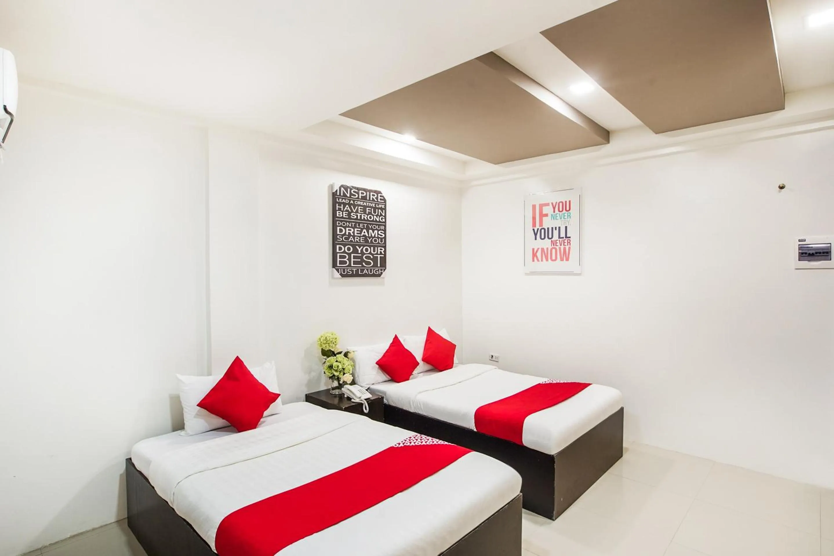 Bedroom, Bed in OYO 489 Casa Mia Hotel Suites