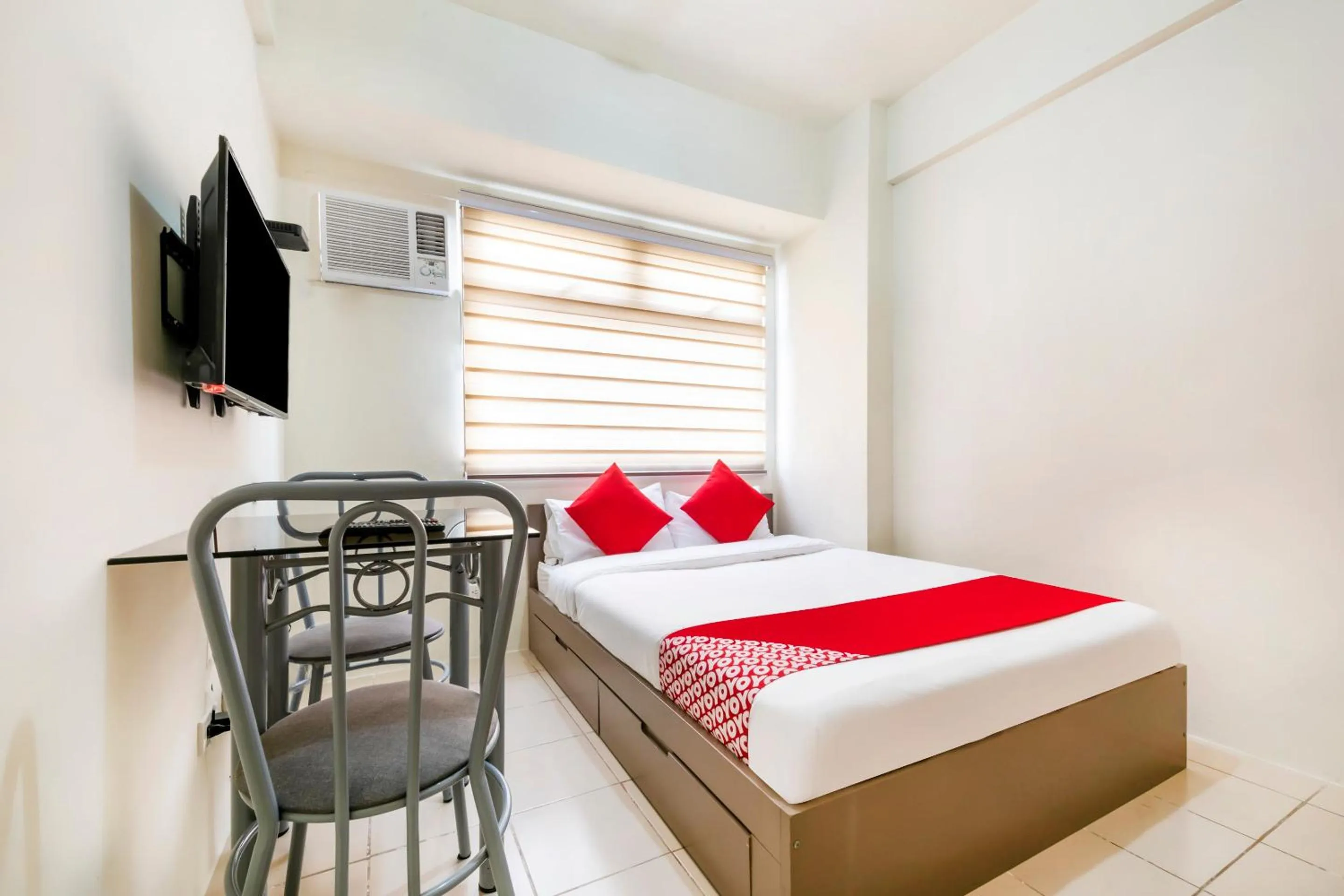 Bedroom in OYO 474 Nizami Condotel