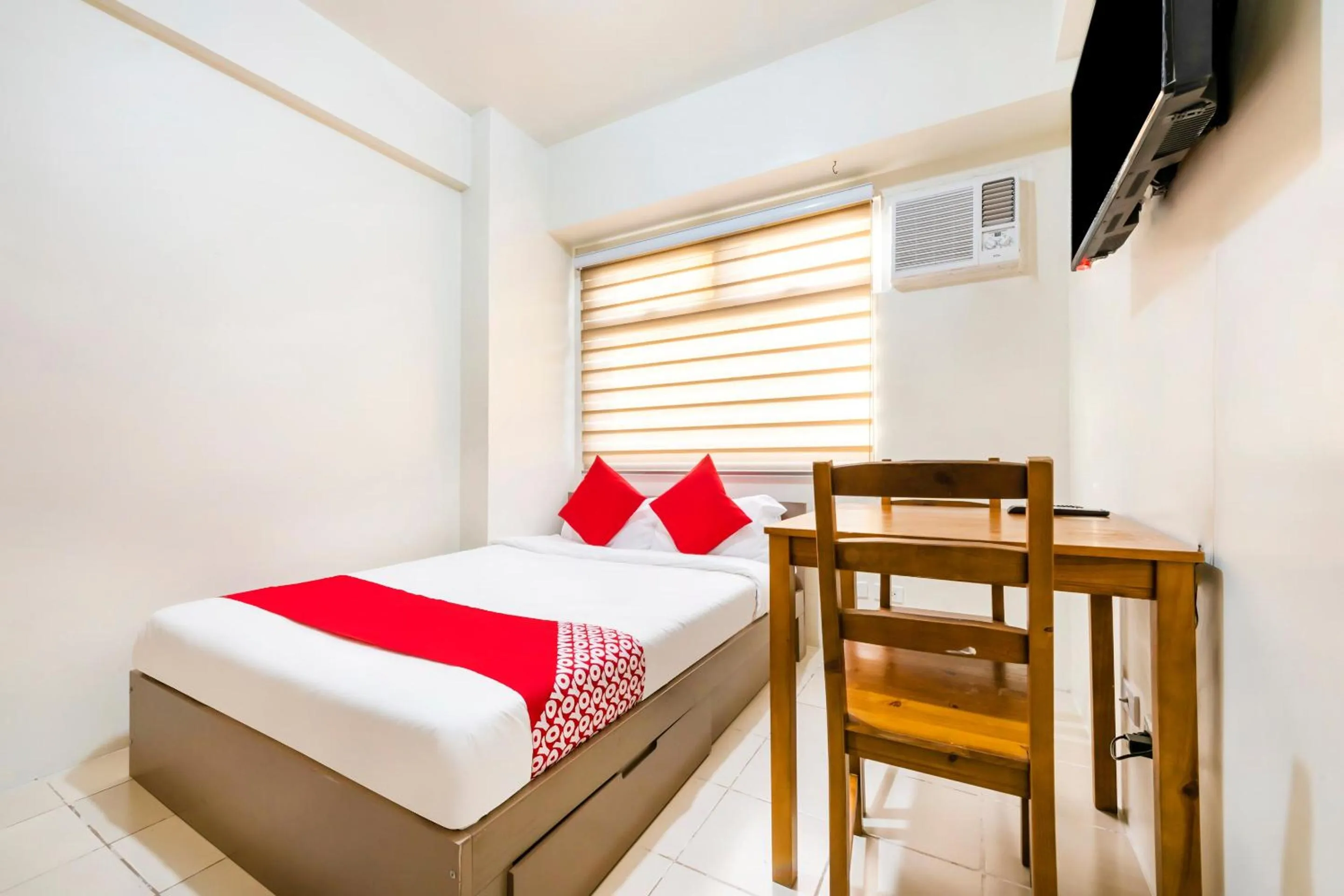 Bedroom in OYO 474 Nizami Condotel