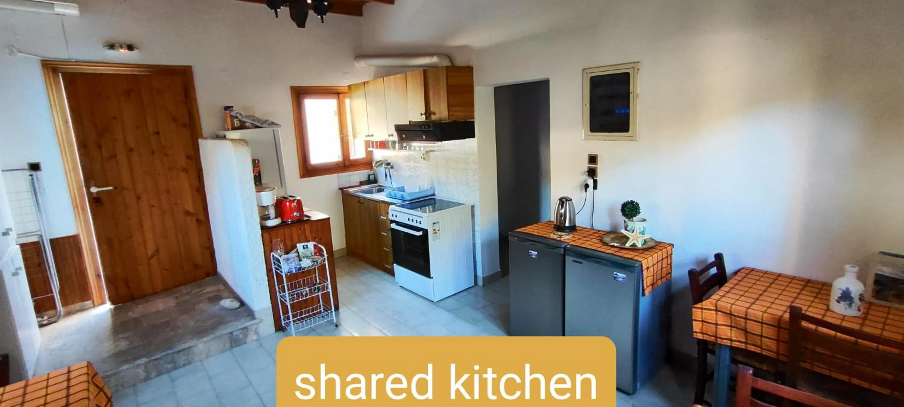 Dining area in Oleander's Garden Traditional Cretan Cottage
