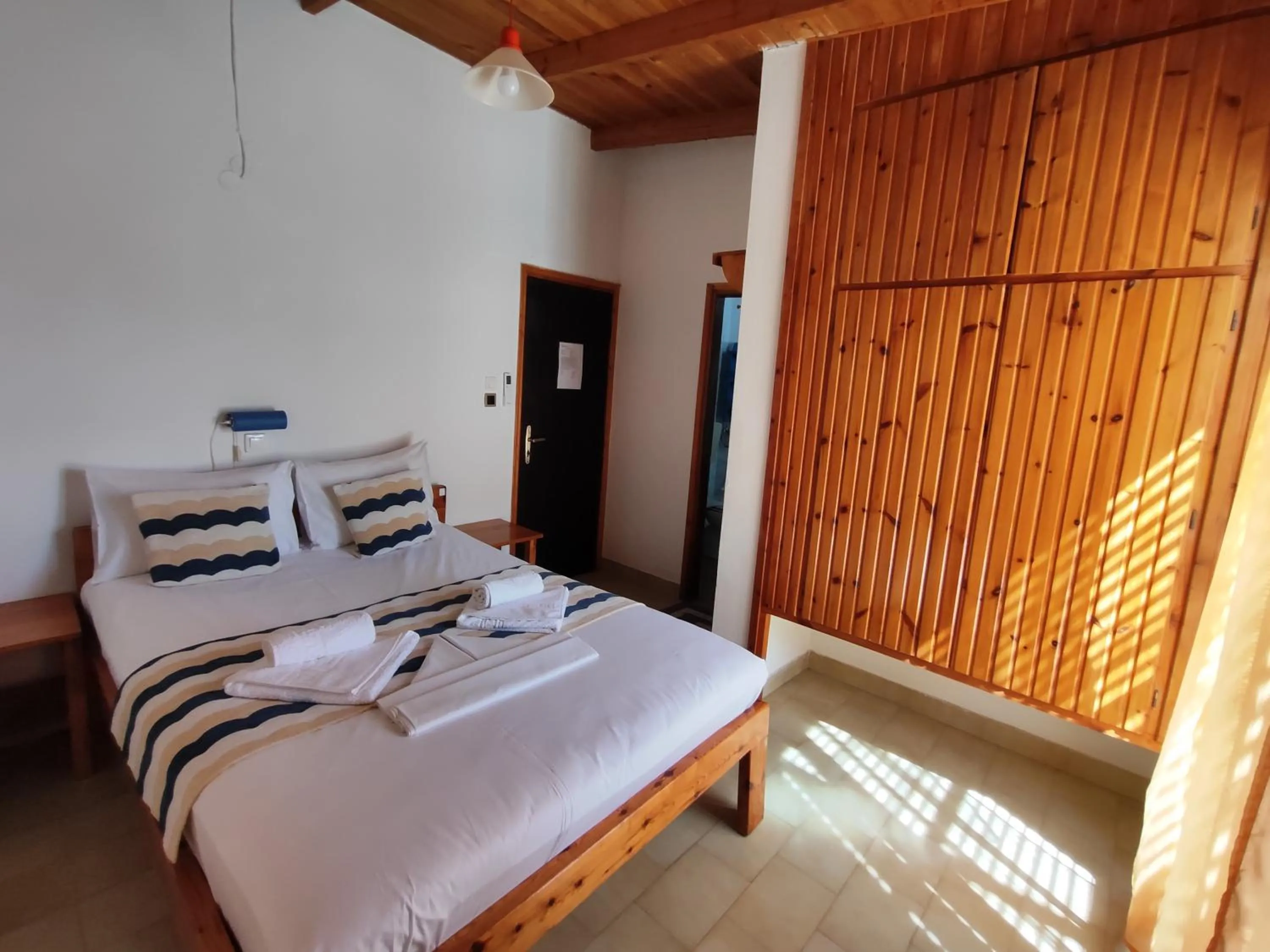 Bed in Oleander's Garden Traditional Cretan Cottage