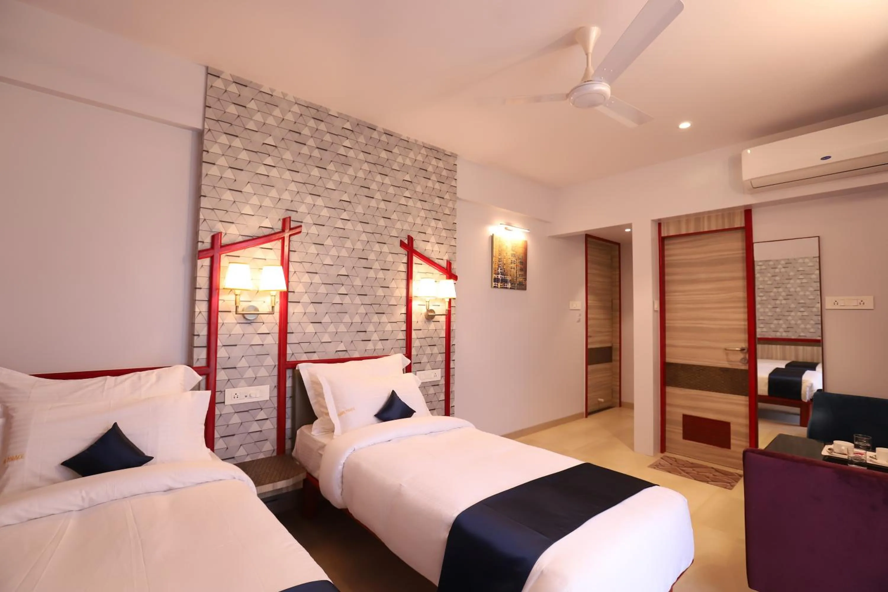 Bed in Hotel Prabha Palace