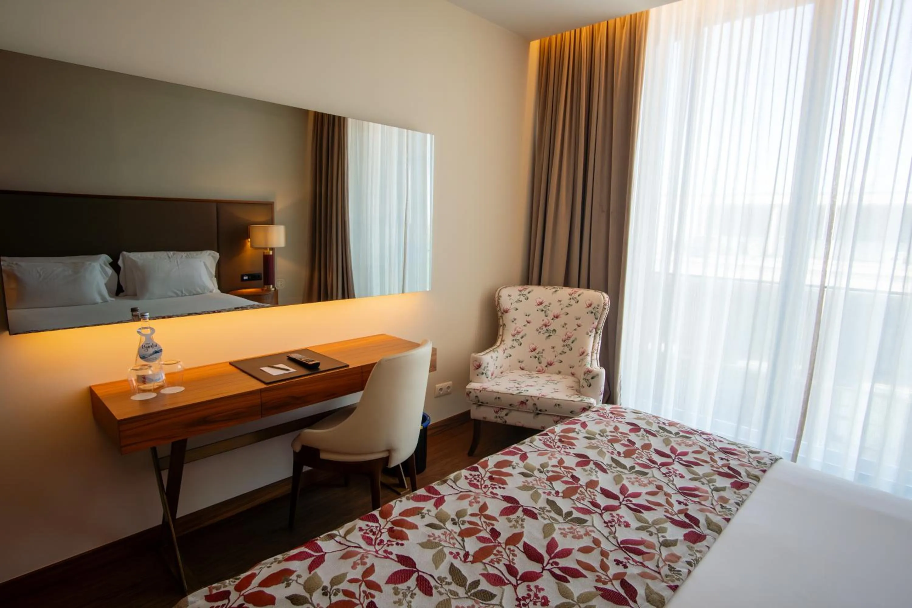 furniture, Bed in Boeira Garden Hotel Porto Gaia, Curio Collection by Hilton