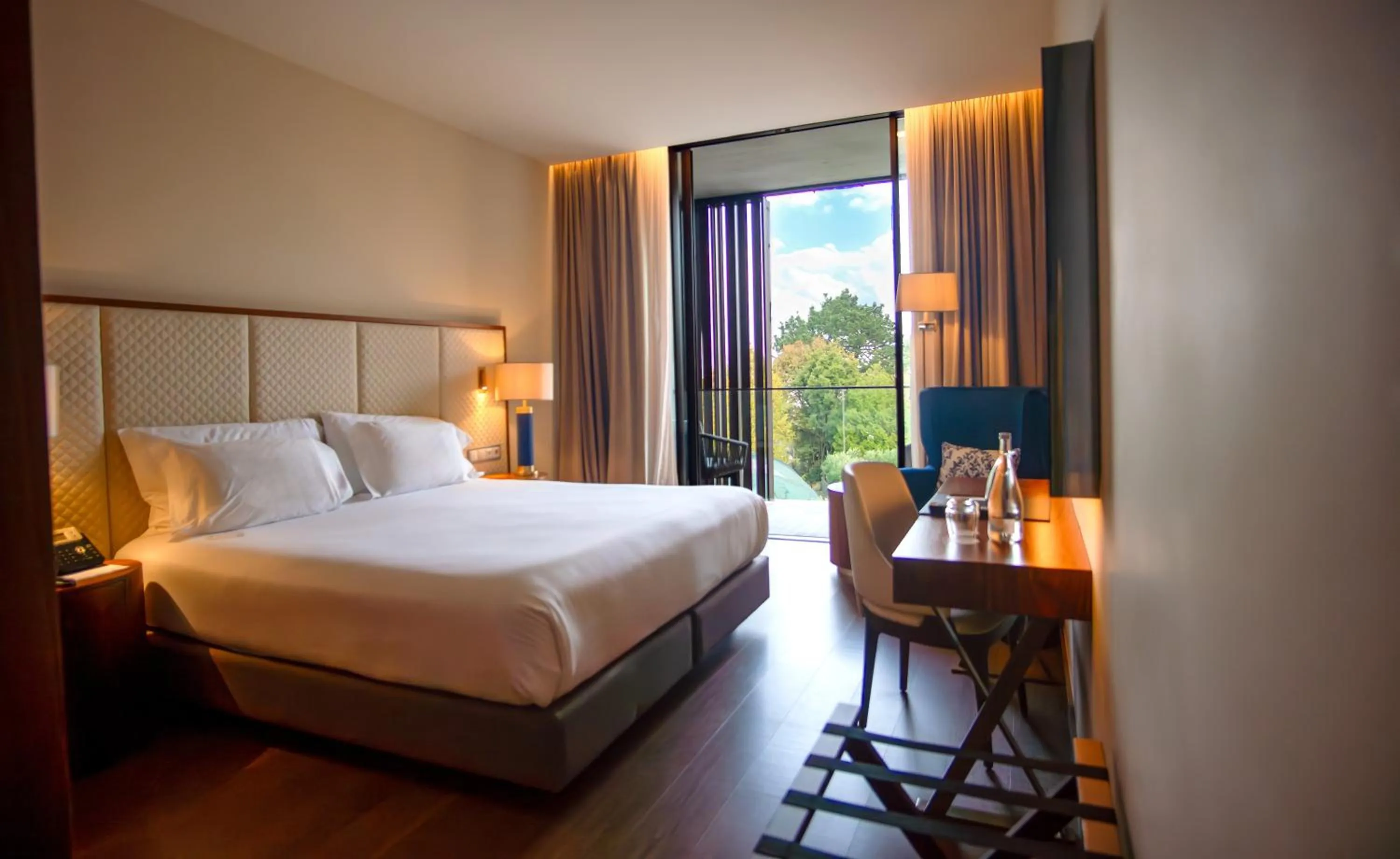 Photo of the whole room, Bed in Boeira Garden Hotel Porto Gaia, Curio Collection by Hilton