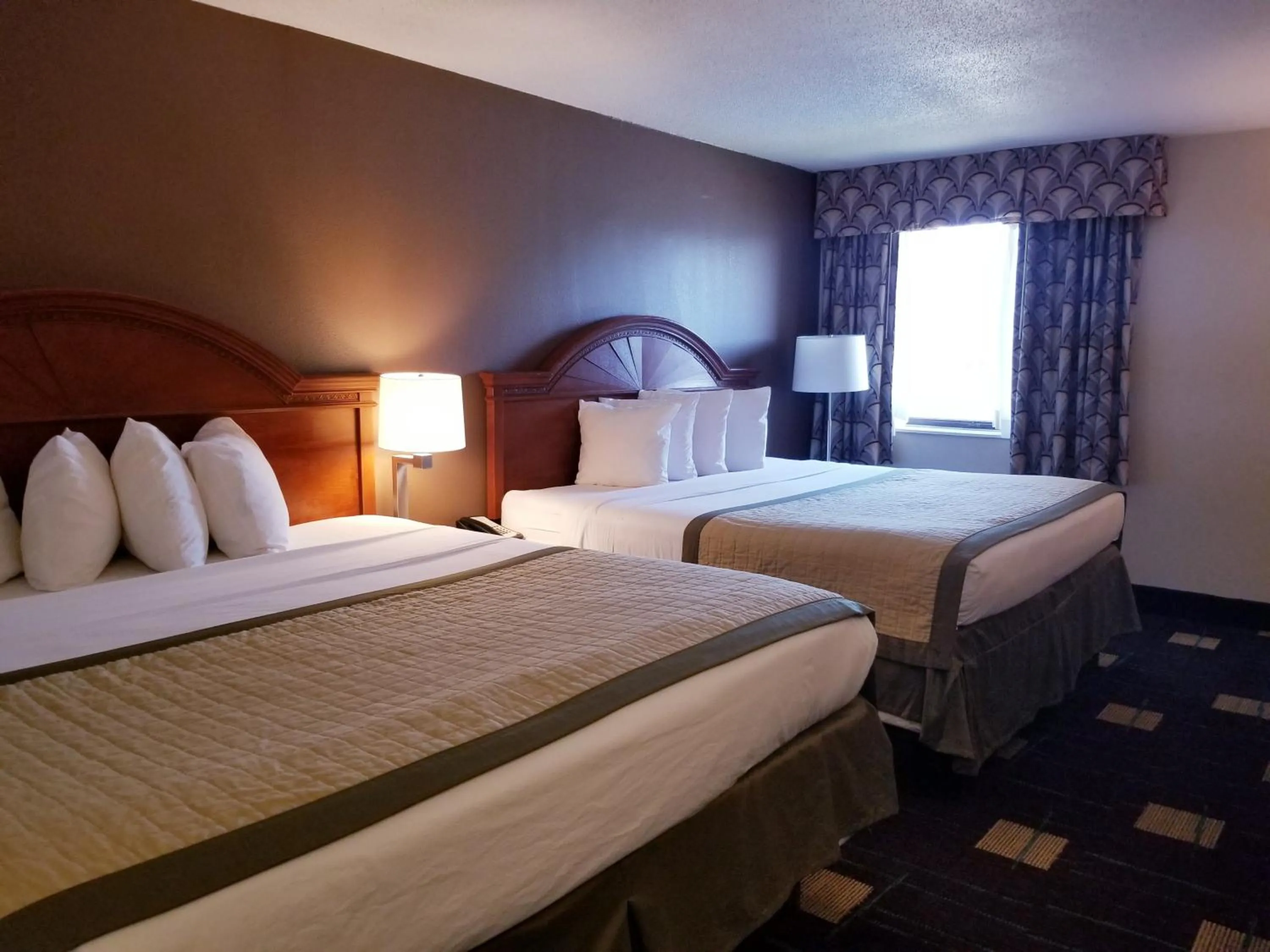 Bed in Baymont by Wyndham Indianapolis West