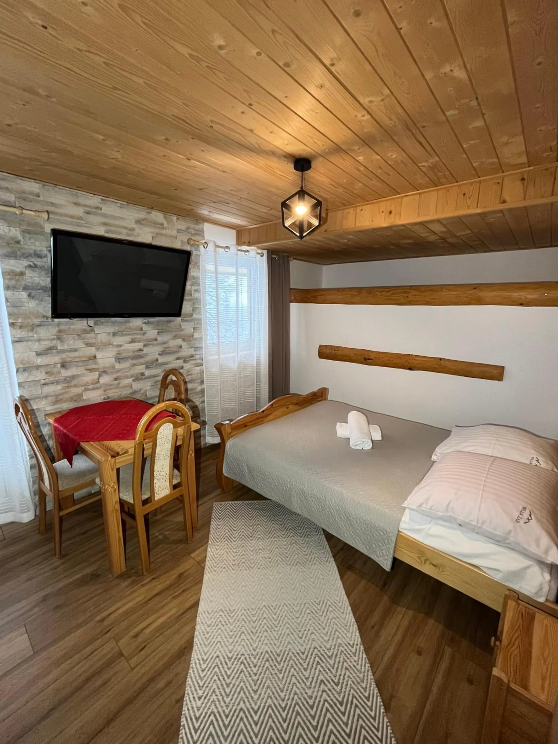 Bed in Pokoje Goscinne u Naglaka Willa Zab