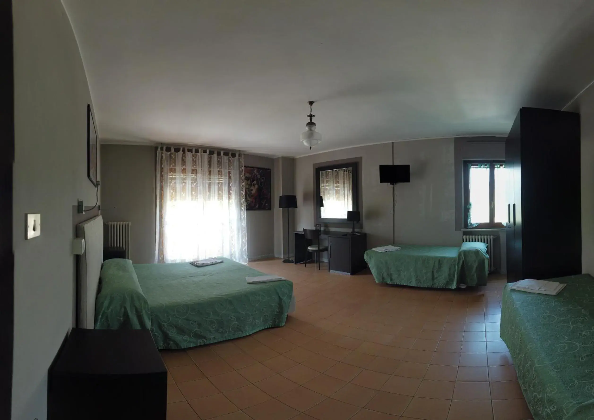 Family Room with Balcony in Hotel Cristina Family Room with Balcony in Hotel Cristina