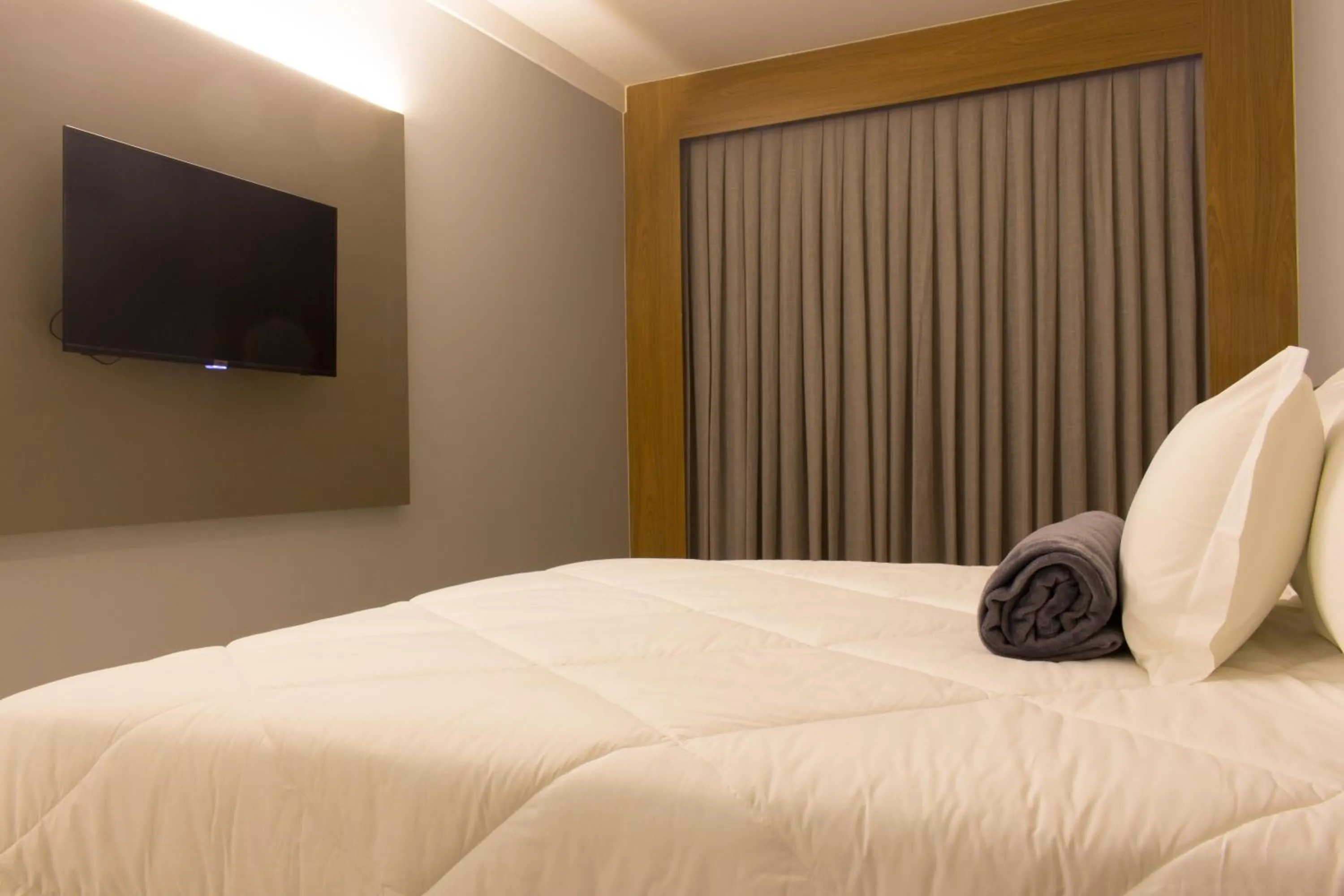 Communal lounge/ TV room, Bed in Dela Inn Andradas