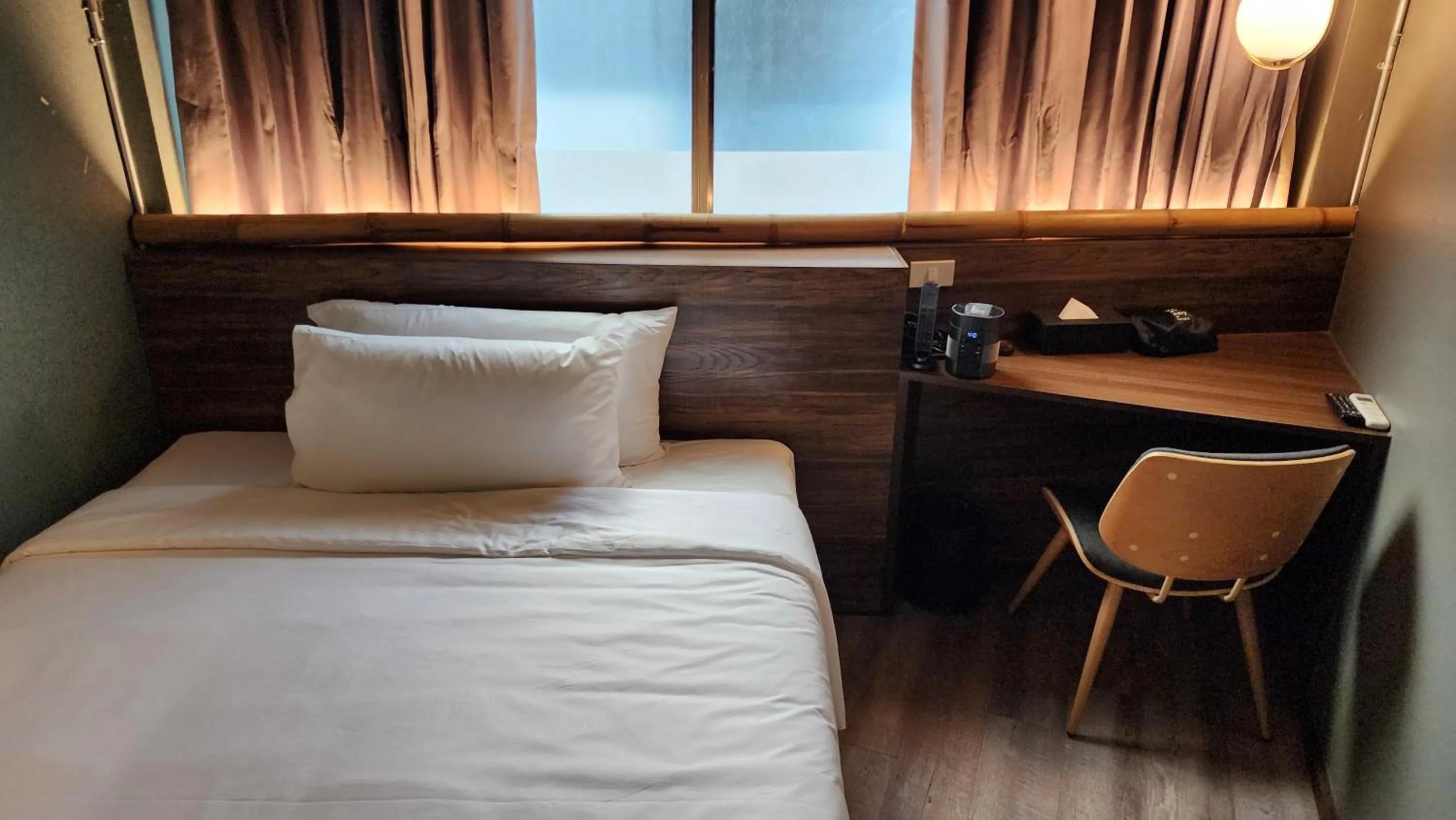 Bed in Hotel Ordinary Bangkok