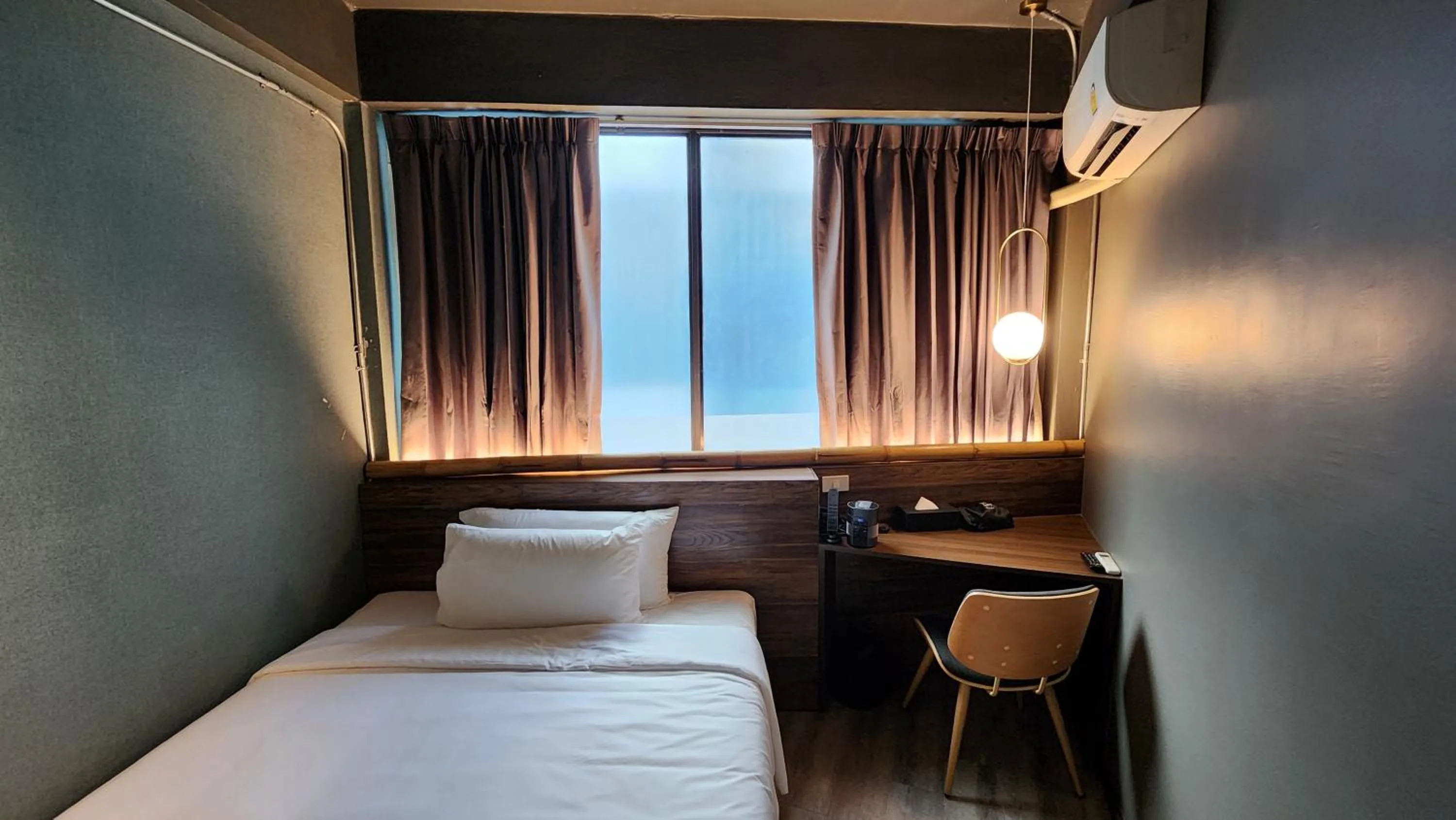 Bed in Hotel Ordinary Bangkok