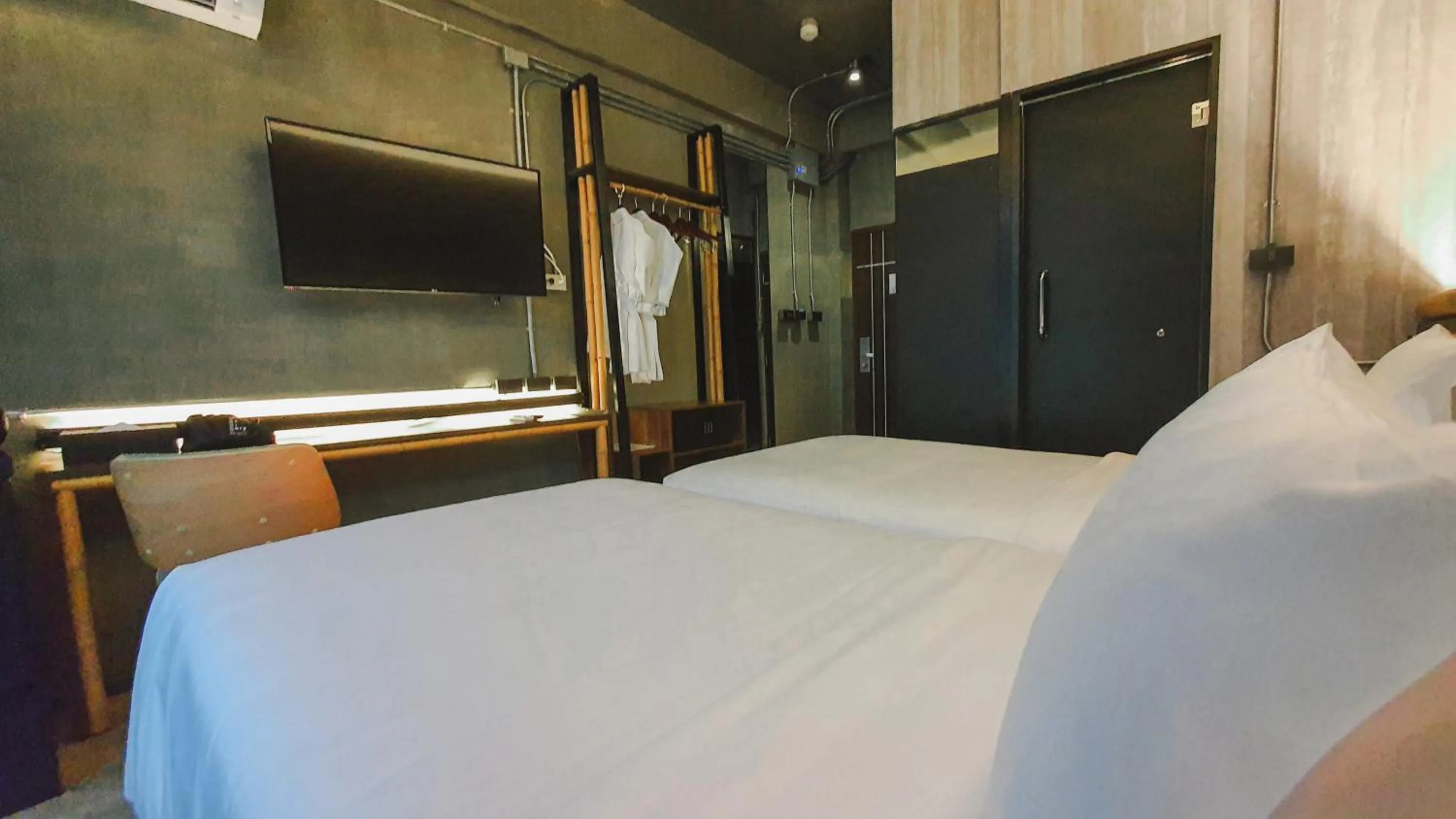 Bed in Hotel Ordinary Bangkok