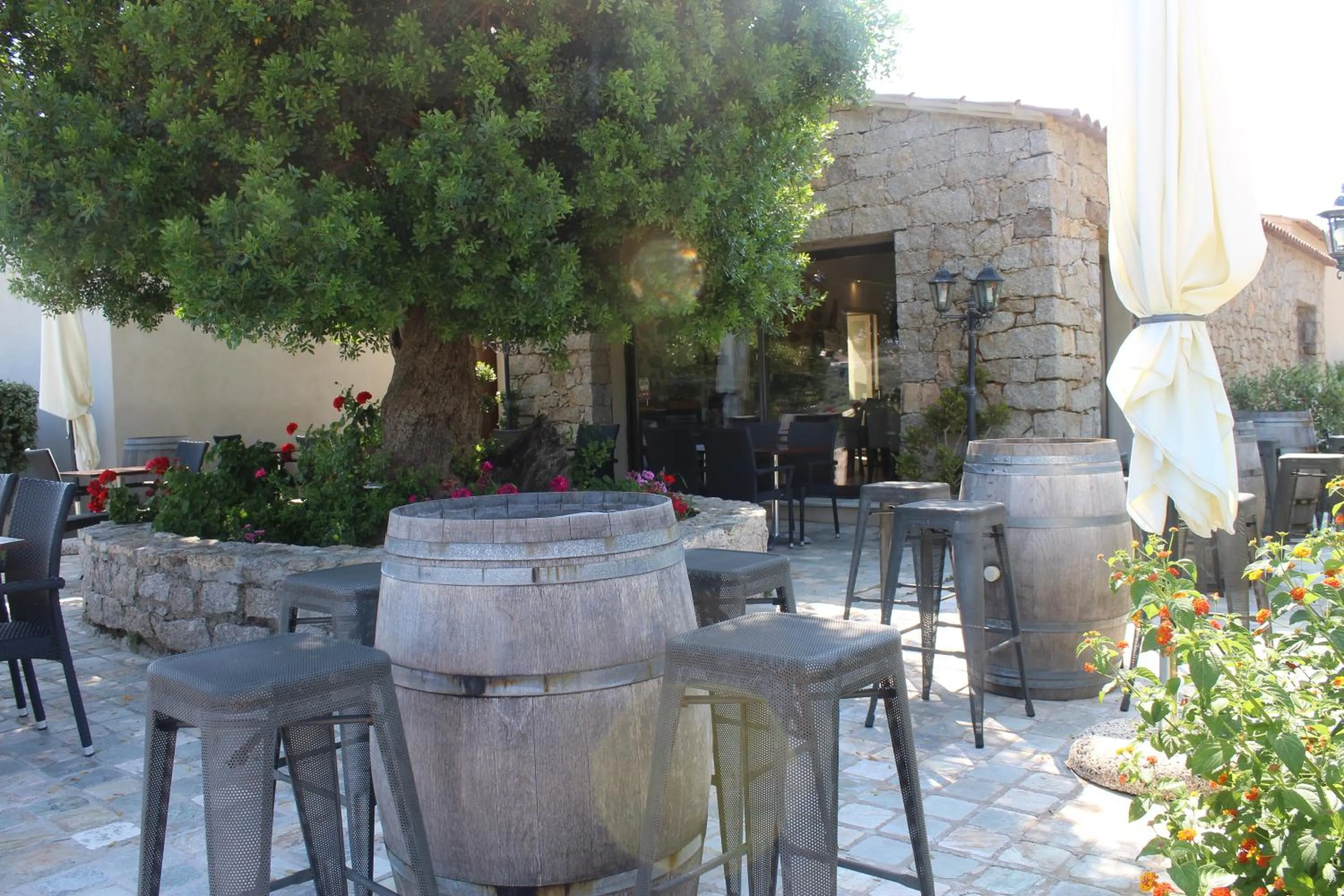 Patio in Hotel & Restaurant Les Bergeries d'Alata